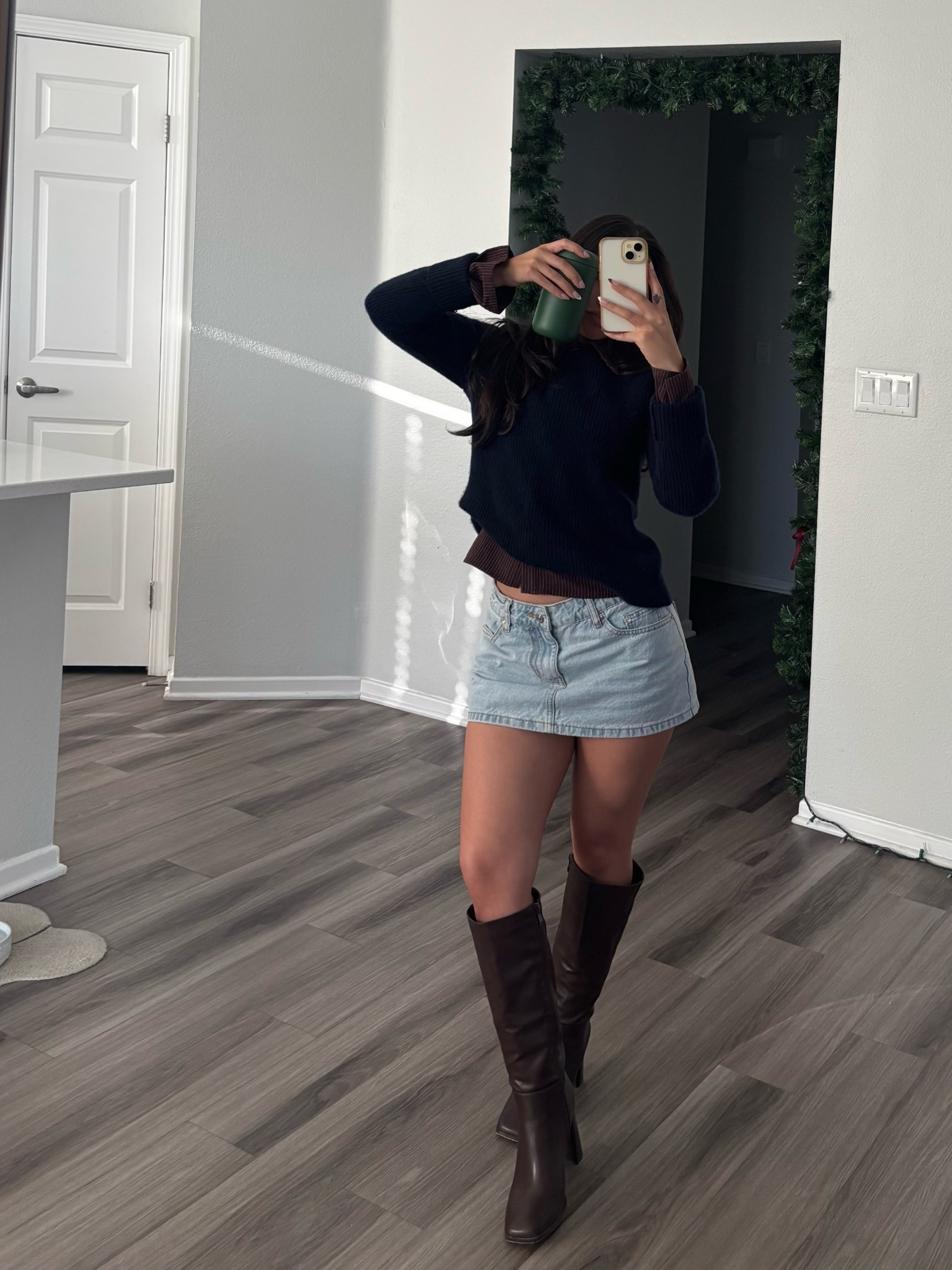 Sweater is a size XS 
Button up underneath is US 0
Mini skirt is XS 🩵