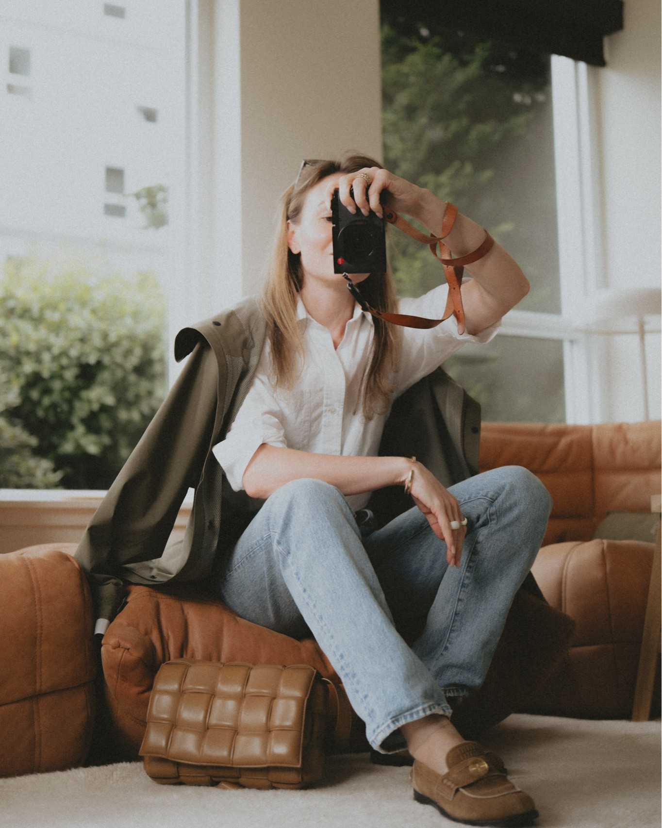 Rainy day of summer 🌧️ 
Straight leg jeans + penny loafers + mini padded bag + white shirt + light raincoat 
Jeans @Madewell 
Shirt: Buck Mason
Loafers: Miu Miu
Bag: Bottega Veneta 
Raincoat: Fjallraven

#LTKootd #LTKSeasonal #LTKTravel