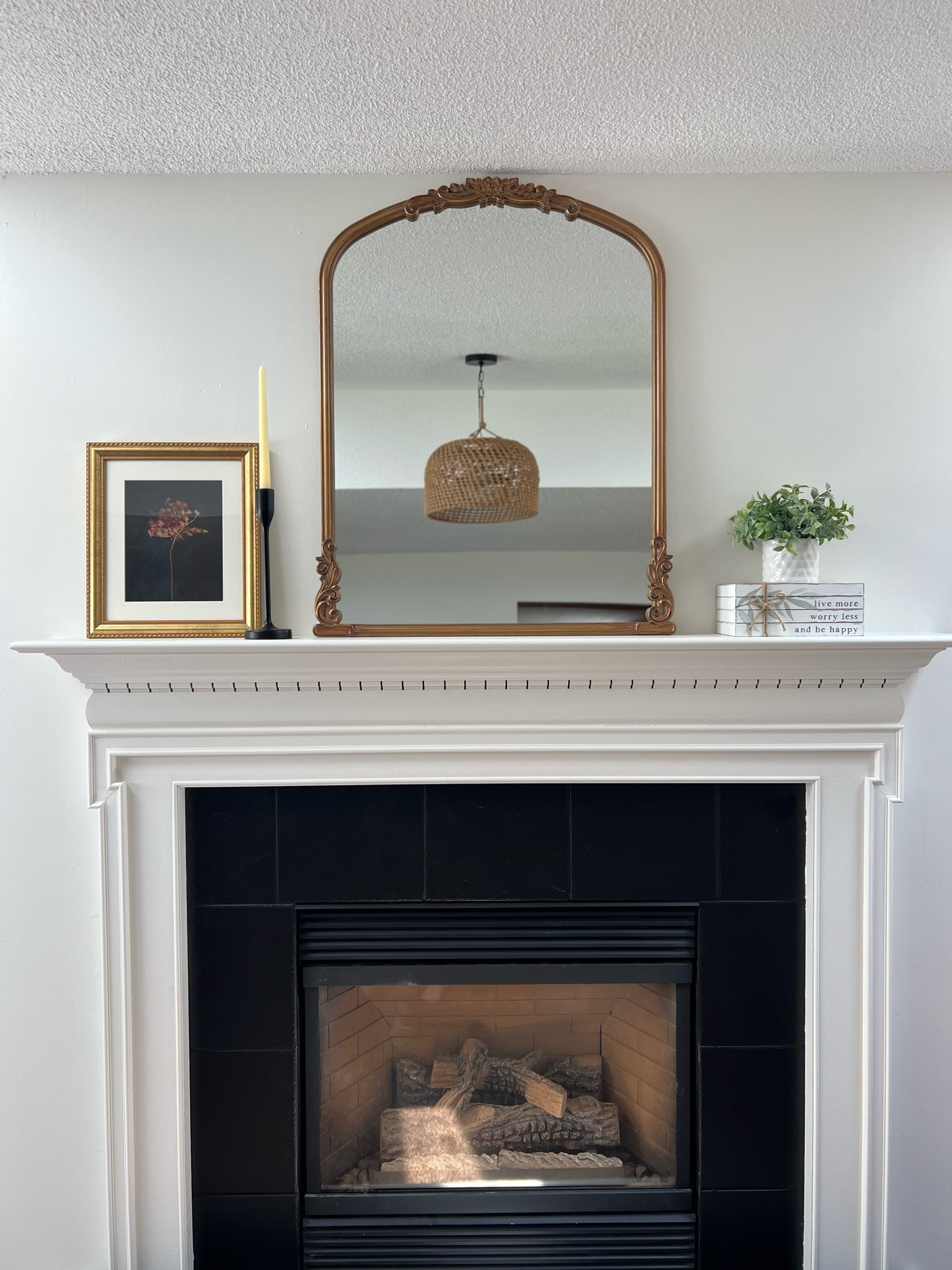 We just redid our fireplace and choosing the color has never been so easy! We used @samplize sheets to decide on the white tones. The fireplace is Alabaster and walls are Swiss Coffee. Tile we painted straight black. We painted all the ceilings as well. Just some trim work and windows treatments and it will be 100% complete 🫶 Check out samplize peel and stick paint color samples for your next home project! 

Samplize | living room | gold mirror | fireplace decor | paint | remodel | home decor | interior paint | interior design | paint 

#LTKfindsunder50 #LTKstyletip #LTKhome