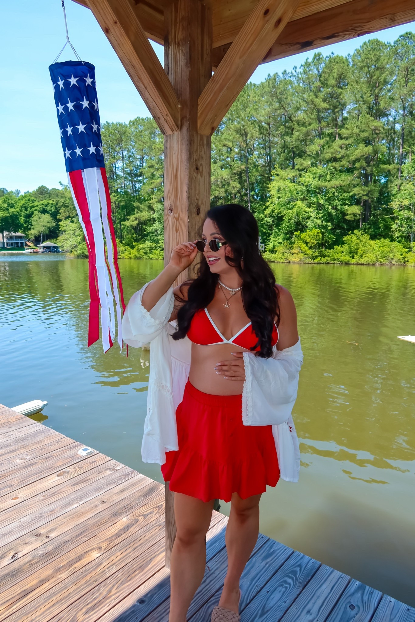 Under $25 red Amazon bathing suit (large, 5+ colors), under $25 white Amazon coverup (one size), under $8 Amazon red bubble skirt (medium, 5+ colors), under $15 Amazon oval and gold sunglasses — perfect for Fourth of July lake or pool days! #founditonamazon 

#LTKSwim #LTKBump #LTKFindsUnder50
