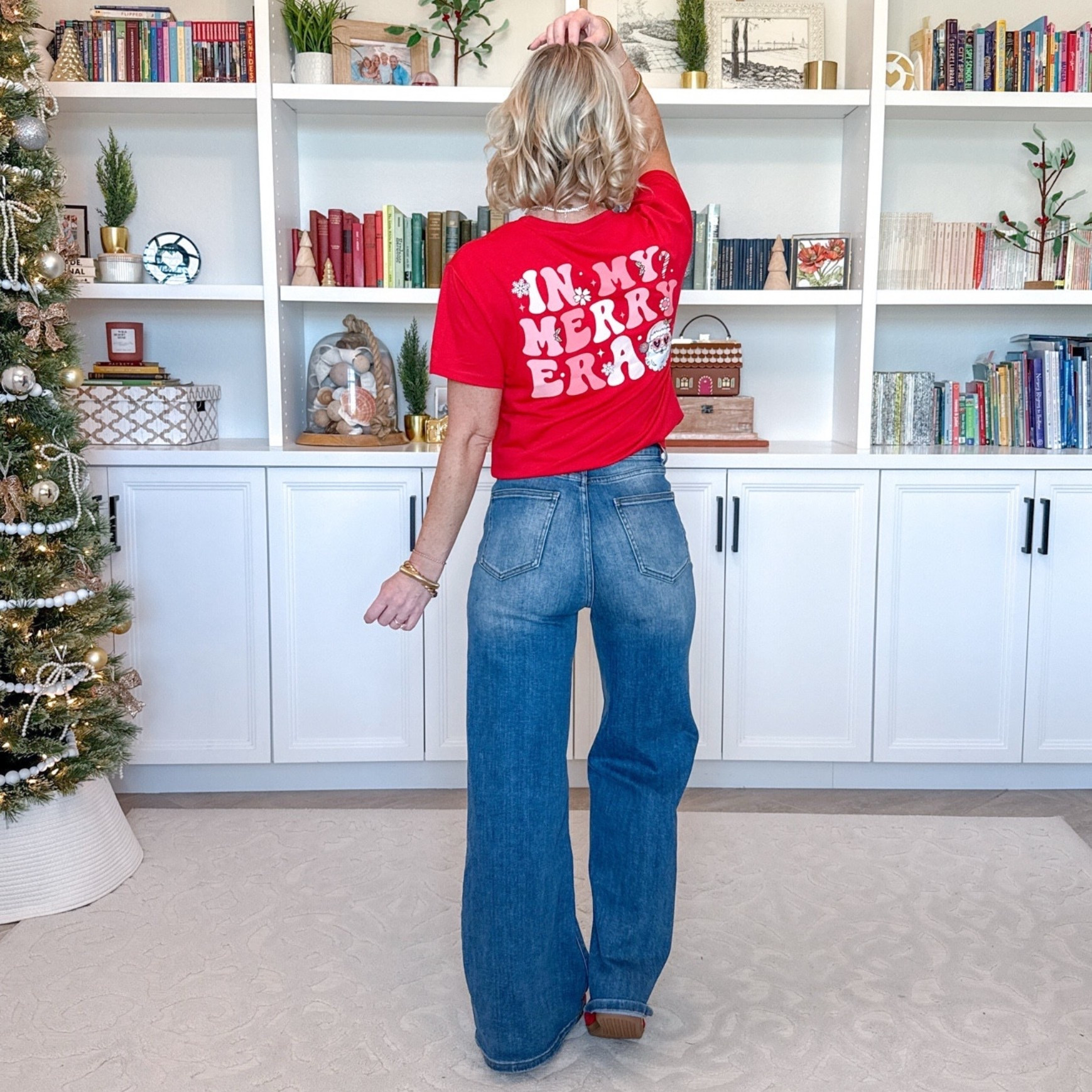Amazon; holiday graphic tees 
 • Wide leg jeans - size 25.  
‘In My Merry Era’ Tee - size small. 

 