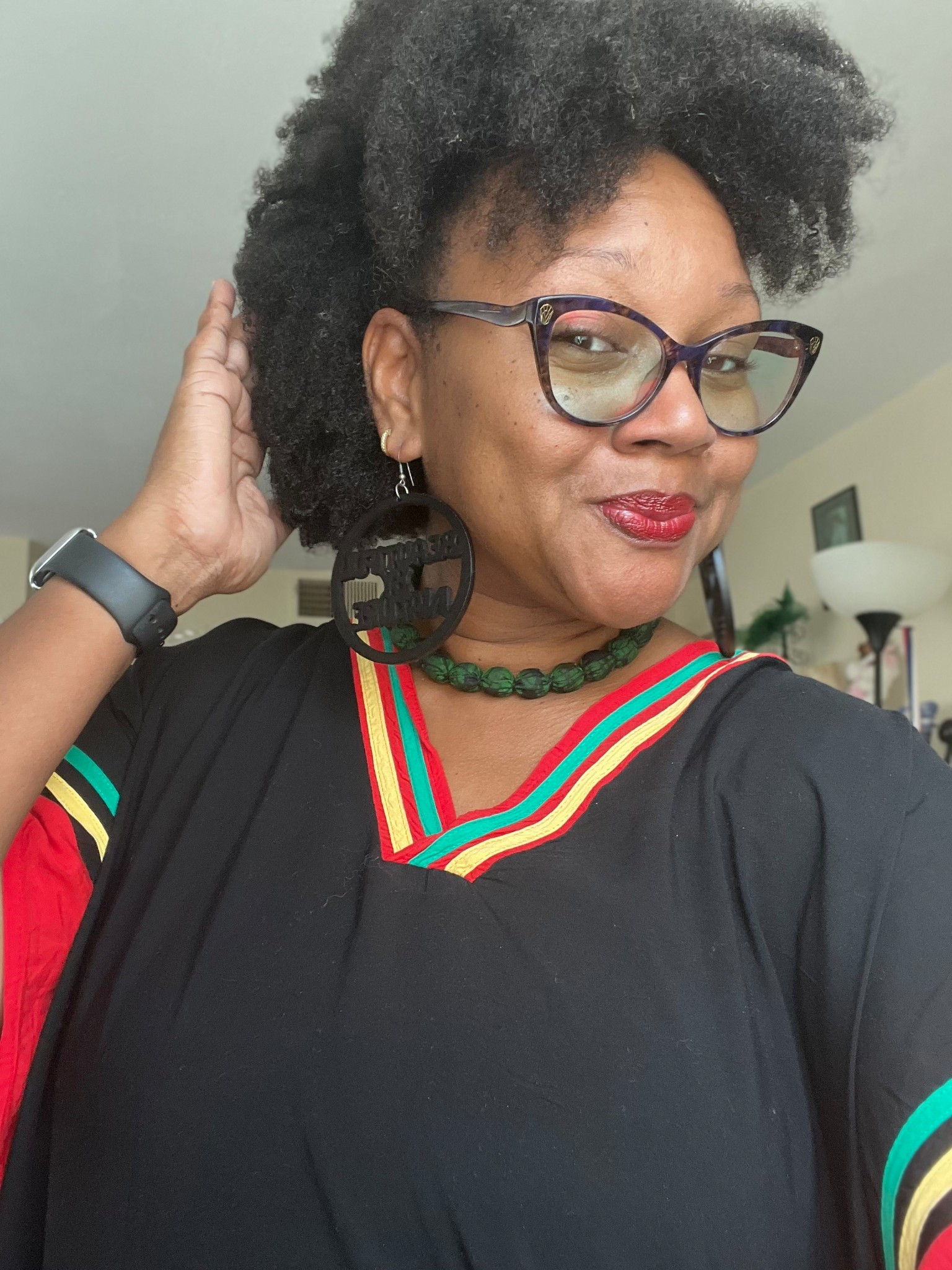 Stylish black caftan with yellow, green and red trim. Can also be used as a beach cover up

#LTKootd