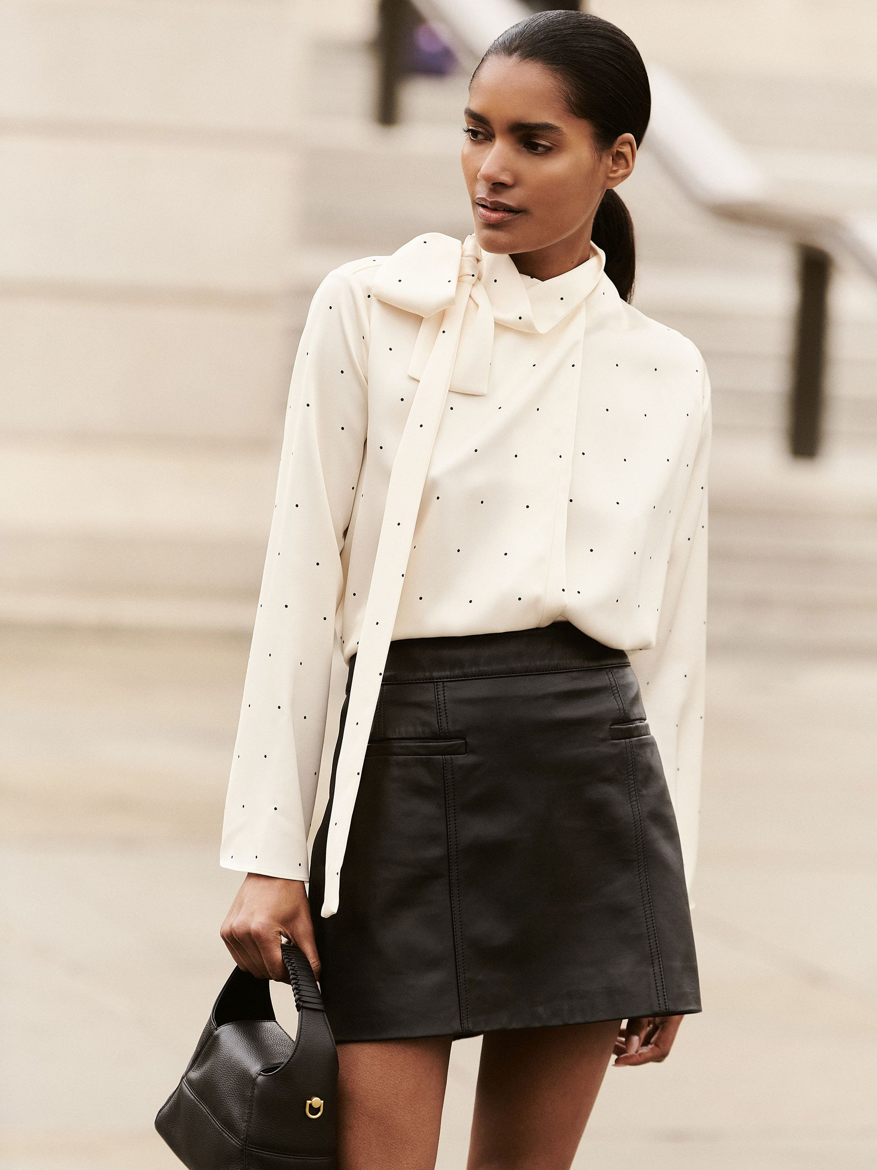 Leather Welt-Pocket Mini Skirt in Black | Reiss UK