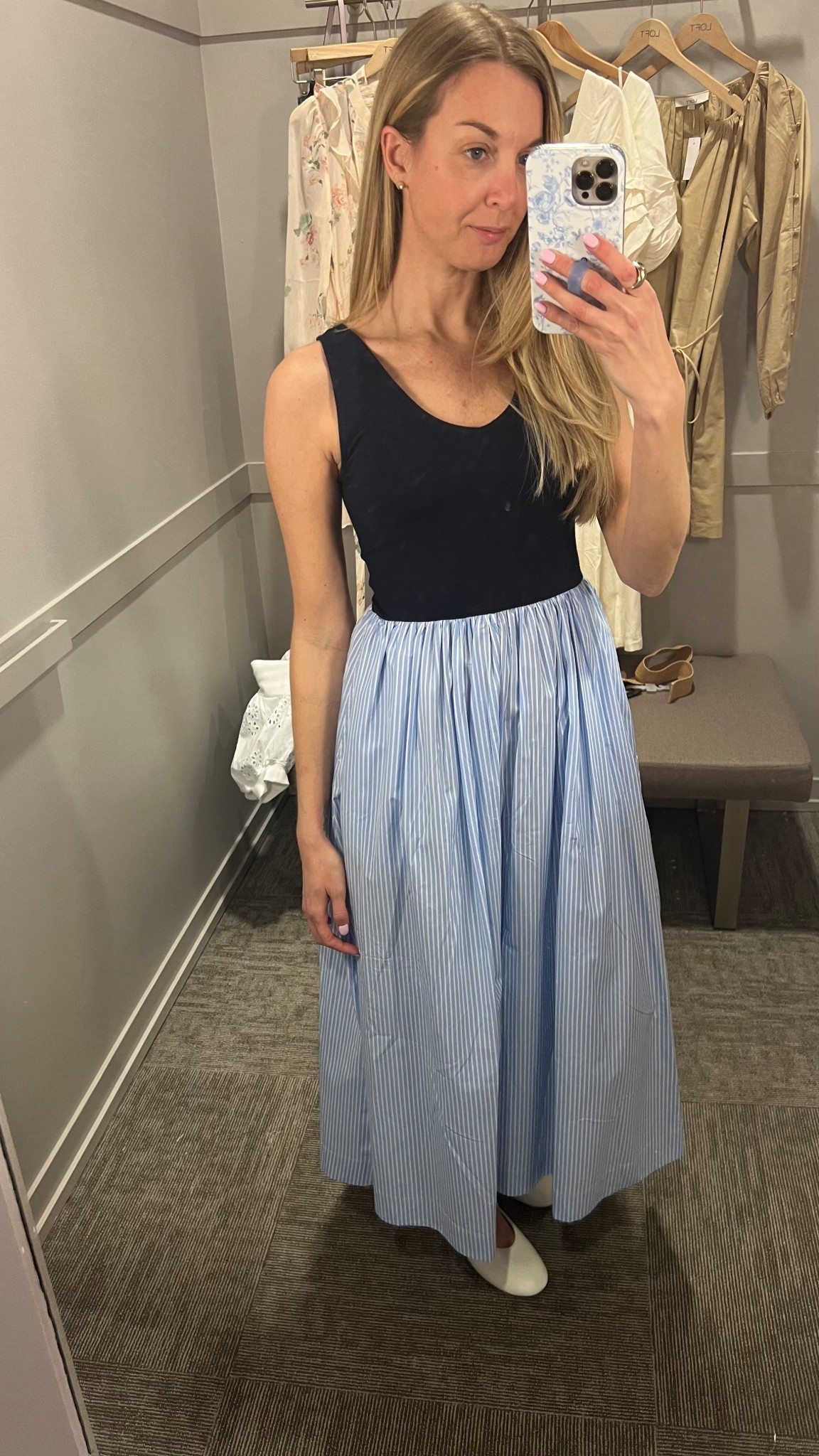 Striped midi dress that is so coastal and chic! ⚓️ It has pockets, it’s flowy, and it’s absolutely beautiful. Wearing size 2. 

Spring dress, summer dress 