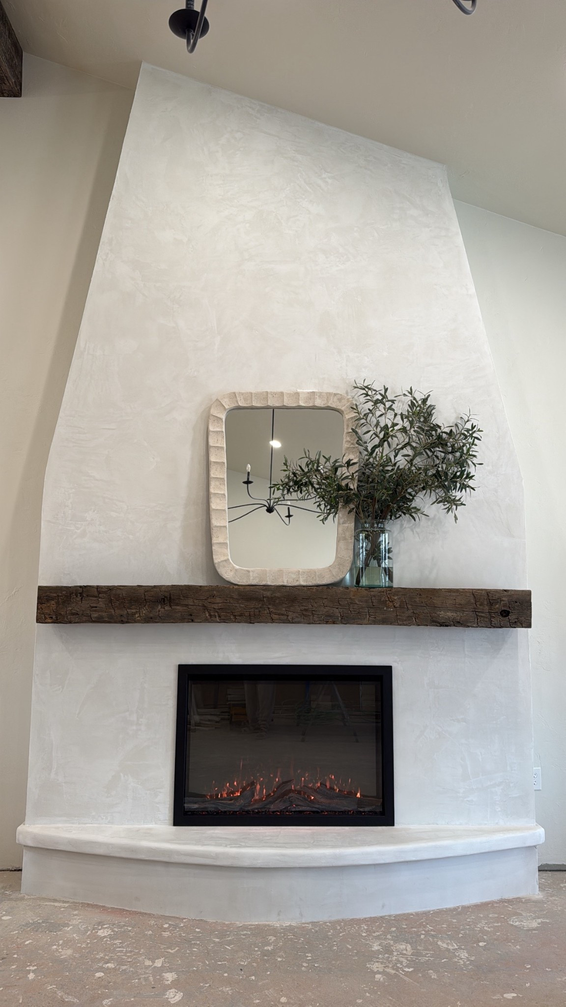 Electric fireplace! This one has the real sound of a fireplace as well but you can turn it off if you don’t want to hear it  

#LTKSeasonal #LTKHome