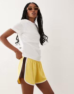 ASOS DESIGN tricot piping detail runner shorts in buttermilk | ASOS (Global)