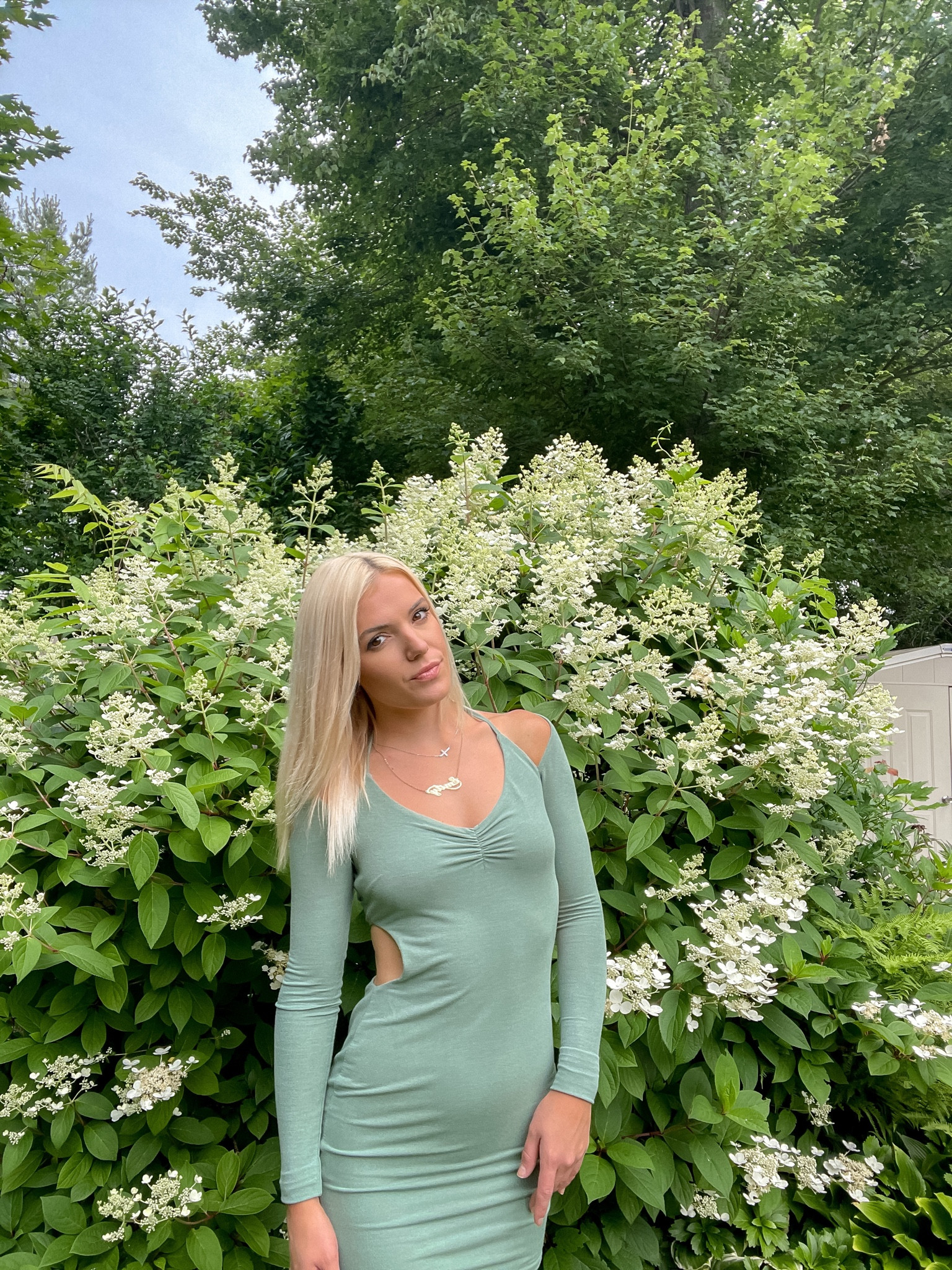 Long sleeve green dress with cutouts 