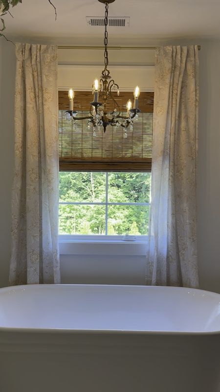 Adding these floral linen curtains and powered blinds completely transformed the look of our guest bathroom in our home. It is still a neutral color scheme but it adds so much texture and warmth. The blinds are motorized also, so I can raise or lower them with a remote. We love the small conveniences. 

#LTKHome