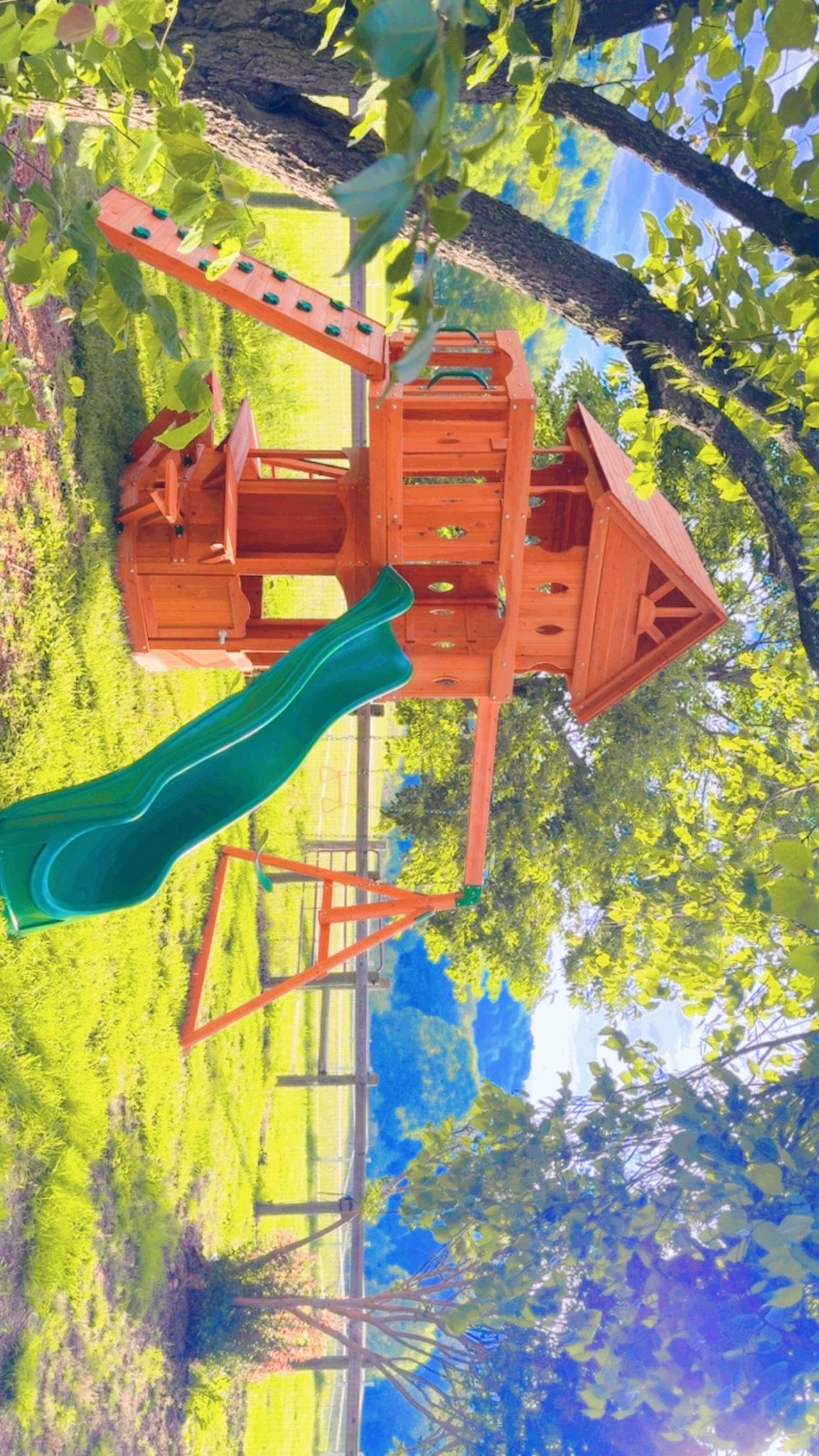 This @backyarddiscovery woodlands 🌳 playset is just perfect 🤩 with its upper and lower playhouse 🏡 (via ladder!) and slide 🛝, rock 🪨 climbing wall 💫, swingset 💨,  little door 🚪 down below to the picnic 🧺 table seats (& “market” windows 🪟- they will love this ☺️), and so much more!! 😍 I’m not kidding when I say I’ve been researching and looking at playsets for YEARS 🥰 - and this one checks ✔️ all the boxes and is better than I could’ve dreamed of 💭 for our babies 👶🏼 out here on the farm!! 🌾

Linked this exact playset 🛝 for y’all over on my LTKit shop!! 🔗 Can’t recommend it enough and such good quality, too!! 🙌🏽