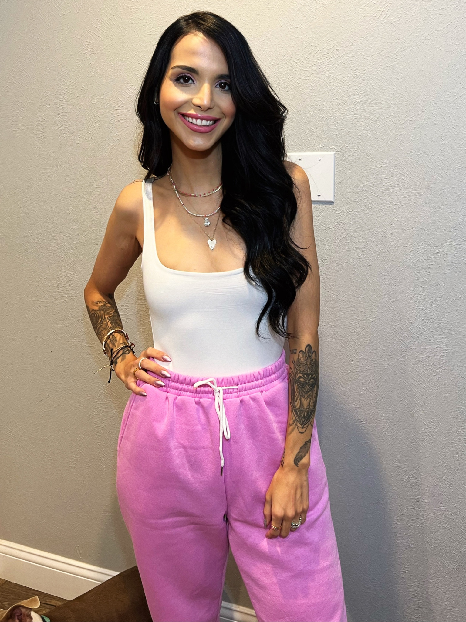 Simple pinky outfit! 
Top: white tank top,crop, or bodysuit 
Pants: pink sweatpants or shorts!! 
Shoes: any glittery,sparkly,or fun looking sneakers! I picked purple vans! 
Handbag; any off white;pink; or pop of color handbag. 
#ltkstyletip #pinkyoutfit 
#comfybutcute #ltku

#LTKunder50 #LTKSeasonal #LTKstyletip