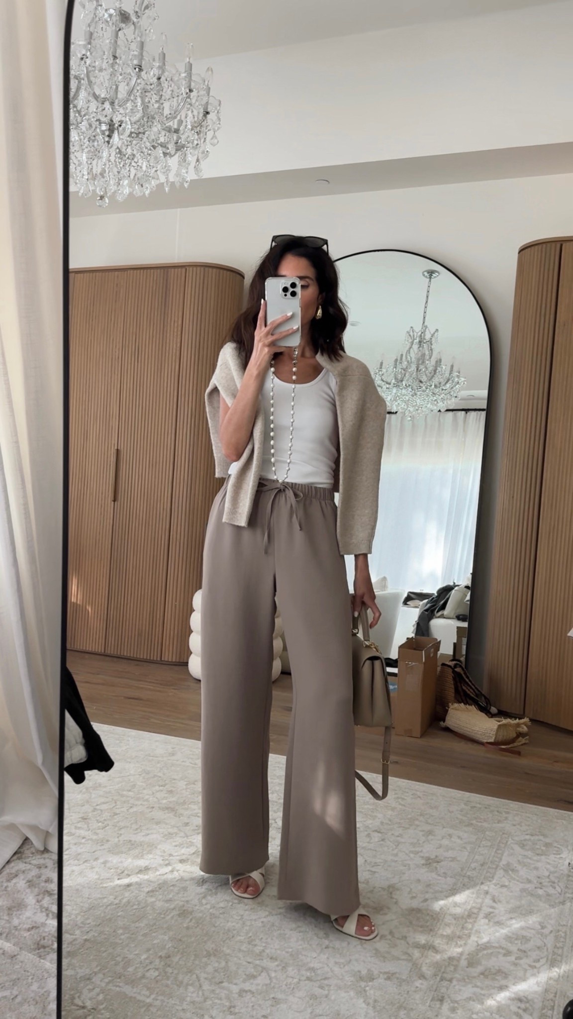 Styling the viral @Aritzia pants! I’m just shy of 5-7” wearing the size SMALL REGULAR pants in the color nomad taupe , small sweater and XS tank top. #stylinbyaylin #springoutfit #basics

#LTKOver40 #LTKgrwm #LTKootd