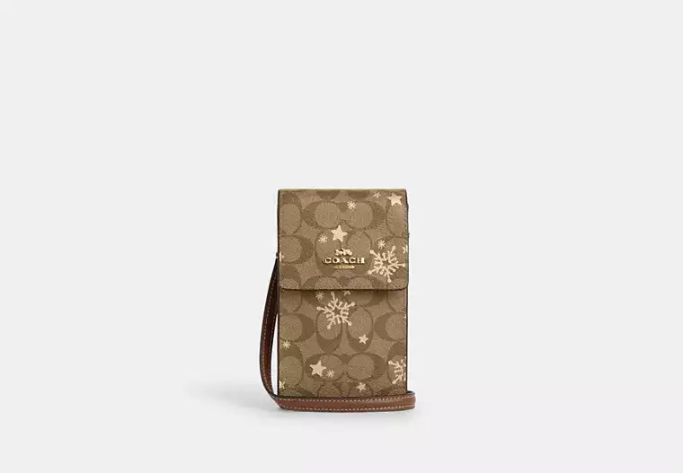 North South Phone Crossbody In Signature Canvas With Star And Snowflake Print | Coach Outlet US