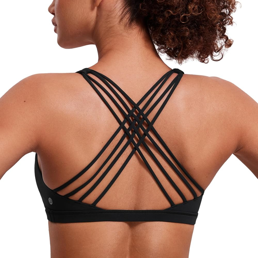 CRZ YOGA Strappy Sports Bras for Women - Criss Cross Back Wireless Padded Yoga Workout Cami Top | Amazon (US)