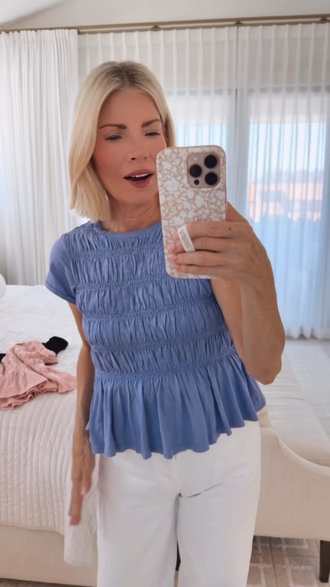 I’m wearing an extra small this adorable top. Love it so much I have it in four colors.