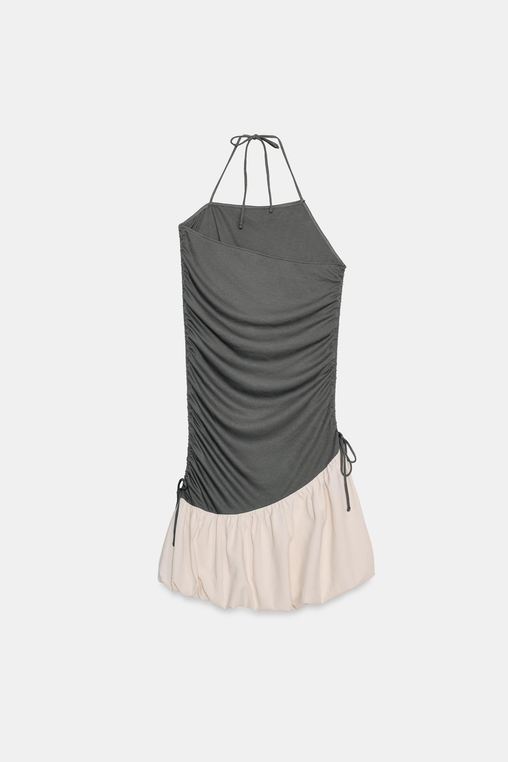Short dress with adjustable halter neck with drawstrings and asymmetric neckline. Adjustable side... | Zara US