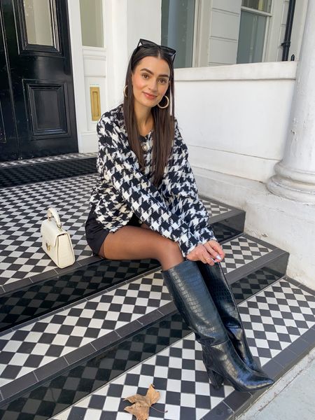 Houndstooth jacket, black shorts, sheer tights, knee high boots, Aspinal bag

#LTKSeasonal #LTKstyletip