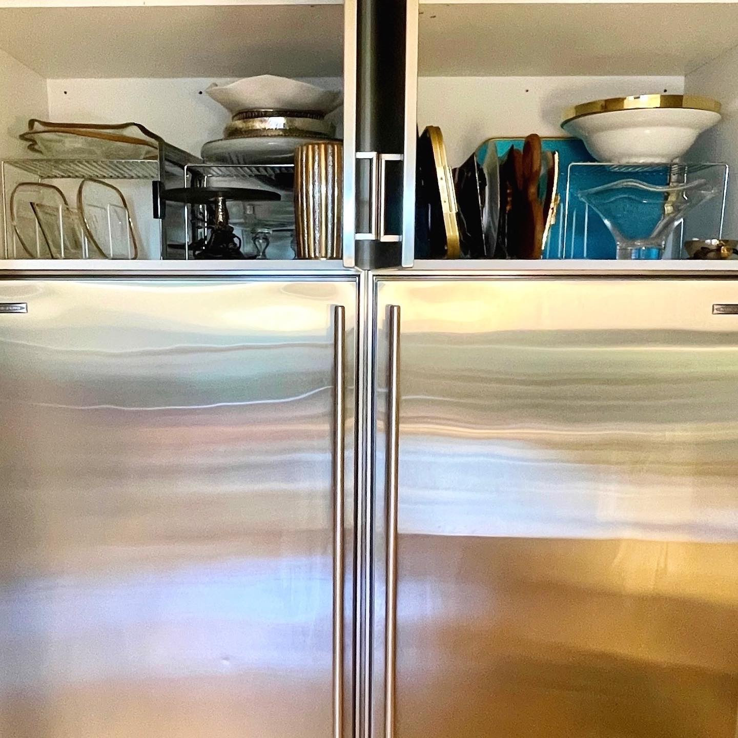 Risers and pot lid organizers help kill that dead space above the fridge to create function for all of your servingwear ✨
•
•
•
#shaiorganized #professionalorganizer #konmariconsultant #konmarimethod #atx #kitchenorganization #kitchenofinstagram #kitcheninspo

#LTKHome