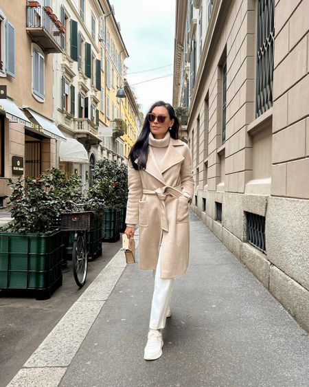 Kat Jamieson wears a Max Mara cashmere coat, turtleneck, Joseph silk trousers and Everlane sneakers. Casual style, classic outfit, neutrals, winter, spring transition. 

#LTKtravel #LTKSeasonal #LTKworkwear