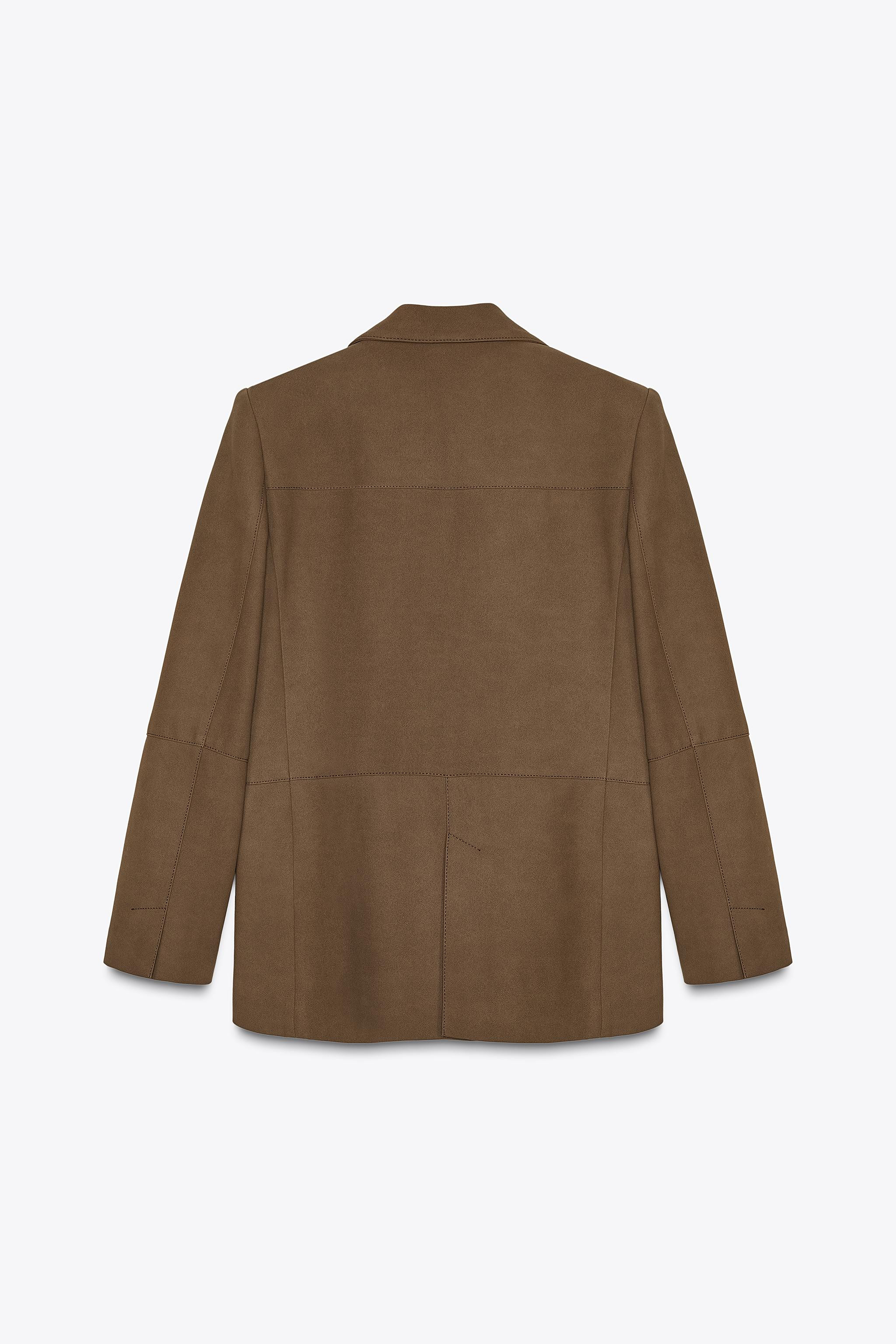 Blazer featuring a lapel collar and long sleeves with shoulder pads. Front pockets with flaps. Ba... | Zara UK
