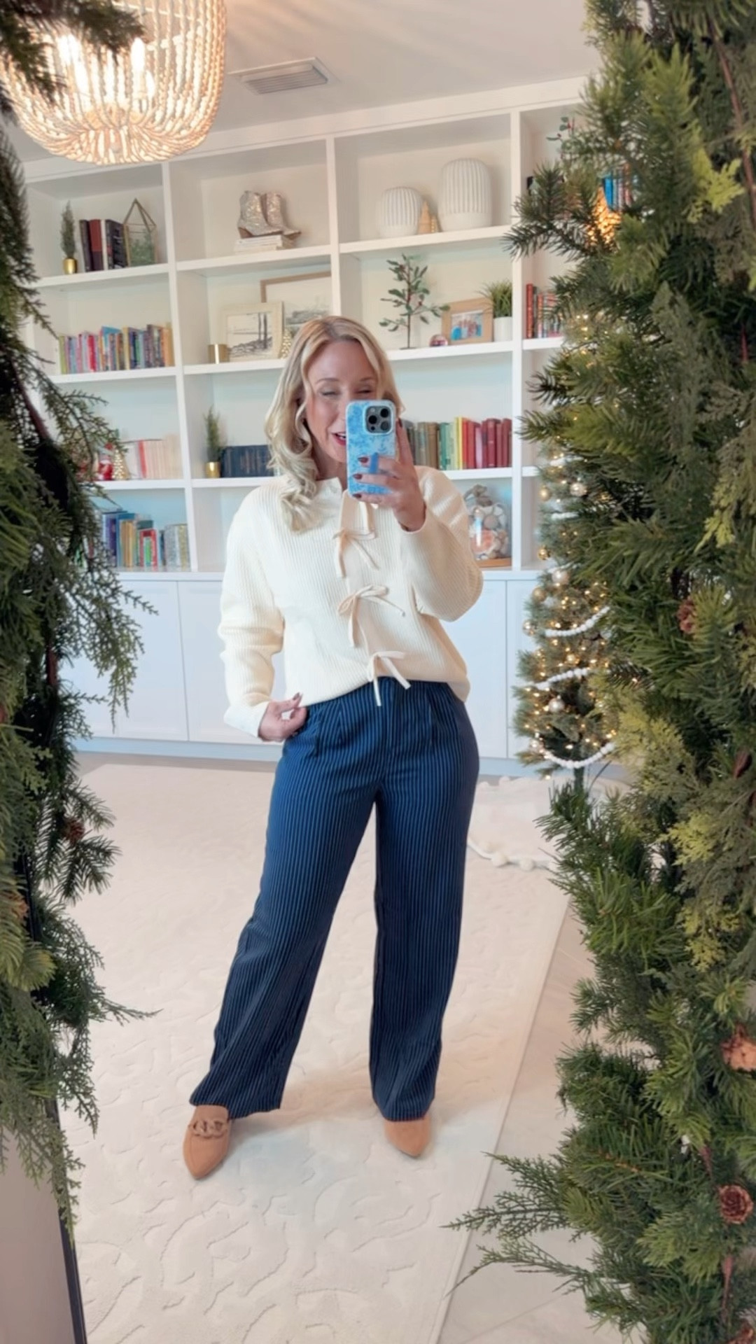 • Bow cardigan sweater - size small.
• Pinstripe trousers - size 4. 
• Mules - tts  

#LTKSeasonal #LTKWatchNow #LTKWorkwear