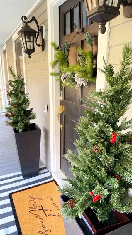 Christmas front porch. Christmas porch decor. Christmas trees. Outdoor holiday home. Outdoor Christmas decor. Holiday finds. Affordable home decor. Walmart holiday decor  

#LTKSeasonal #LTKhome #LTKHoliday