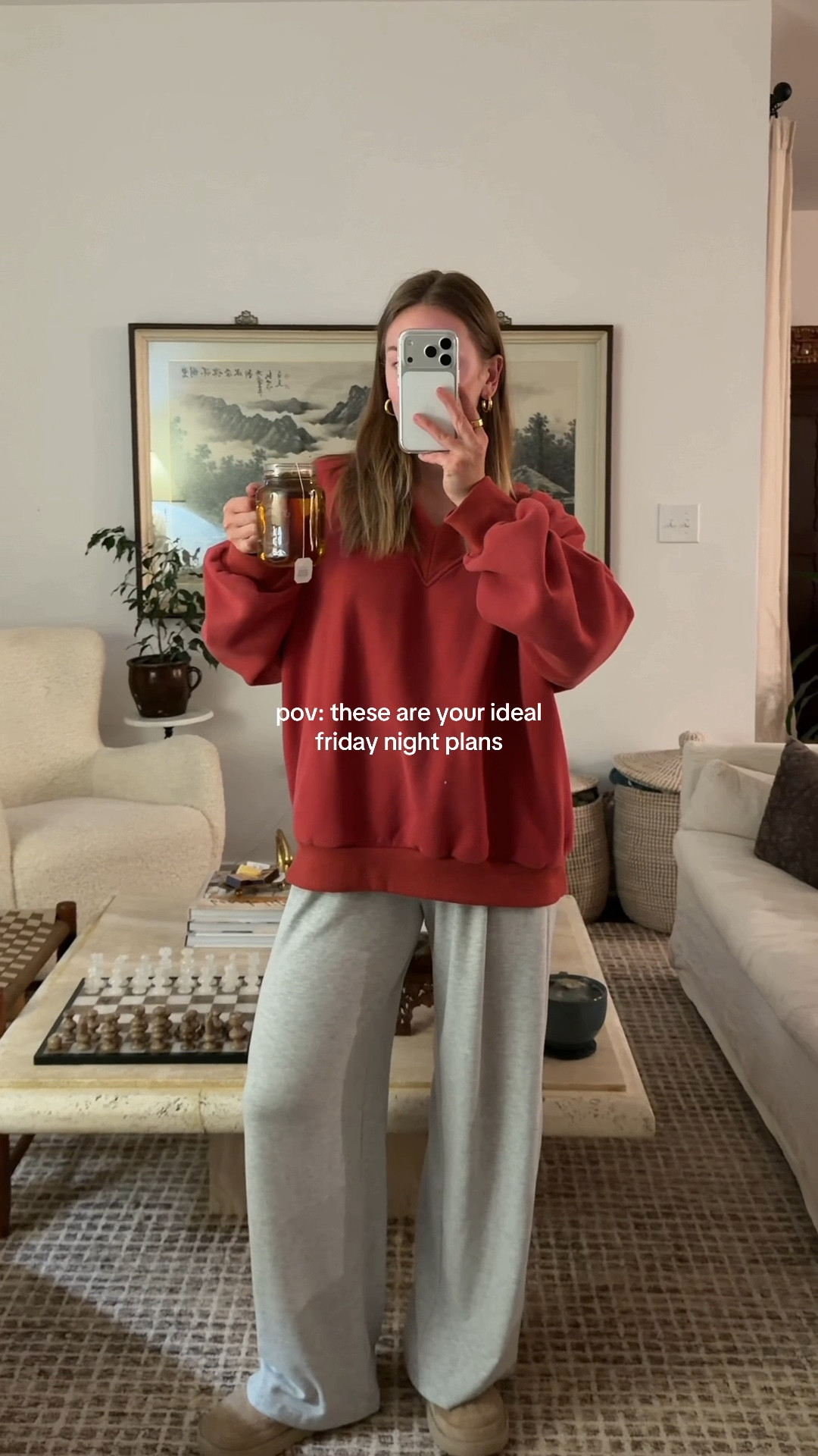 10/31/25 A cozy night in — candles lit, dinner on the stove, and the comfiest loungewear combo from Amazon + Abercrombie. Linking everything from my cozy outfit to our living room furniture, Amazon linen curtains, and Roman shades that make the space feel extra warm and homey. Perfect fall night in. 🤎