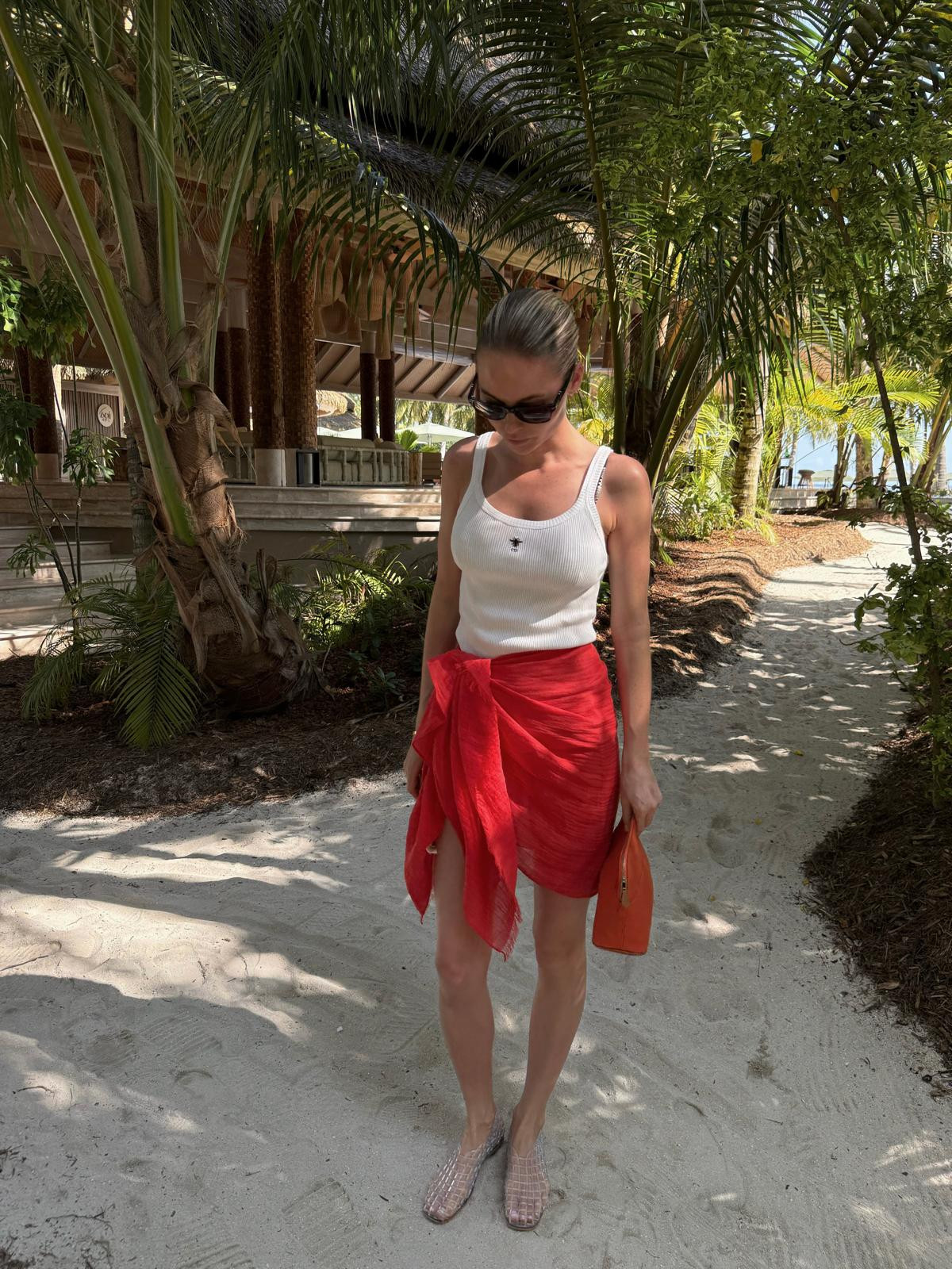 Beach outfit 🐚

Dior ribbed vest, red sarong, red beach wrap, beach cover up, holiday outfit, swimwear, beach outfit, summer style, summer outfit 

 #LTKSeasonal #LTKSwim #LTKTravel