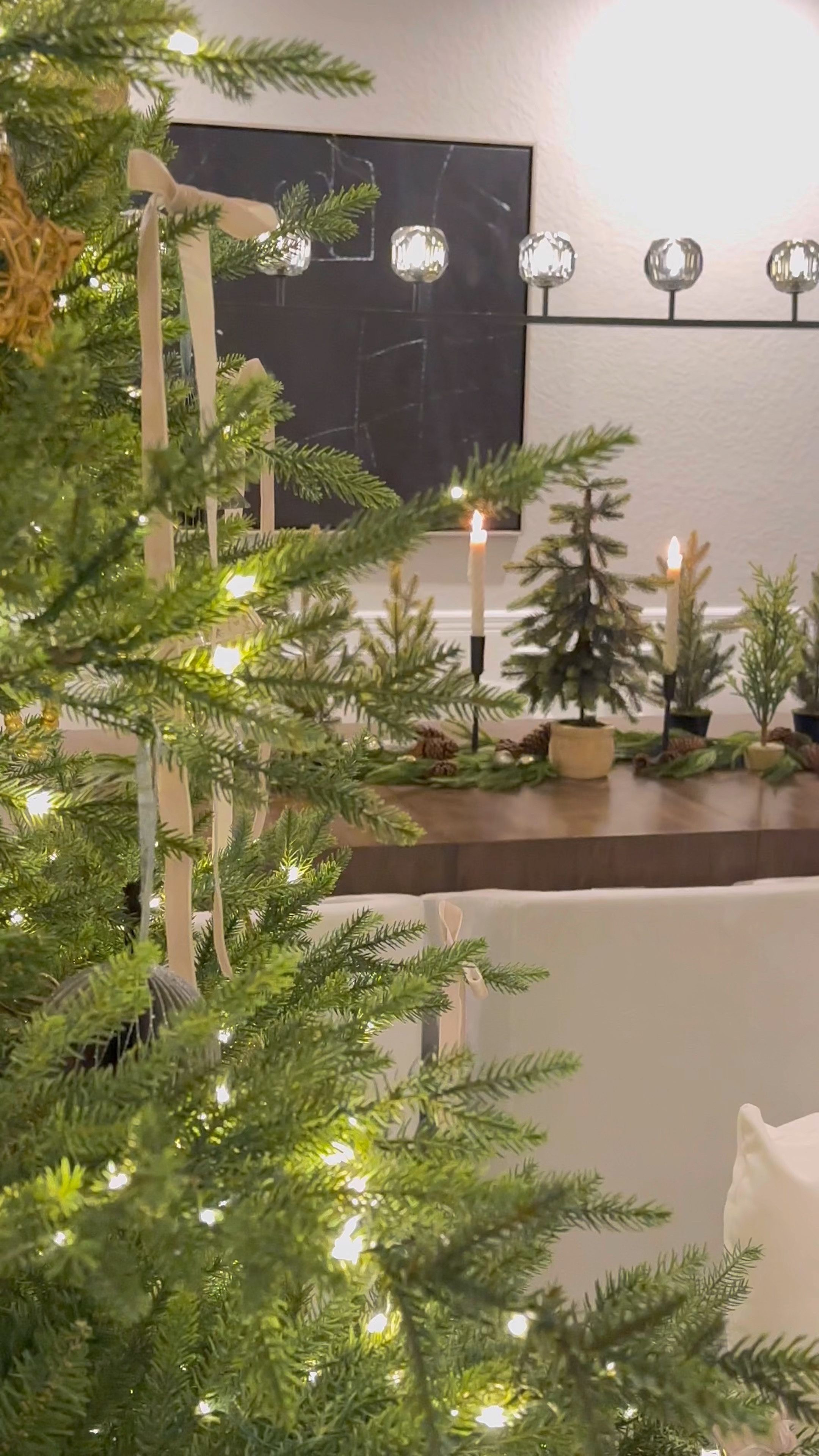 Create a Christmas wonderland with a collection of tiny trees. #christmastrees #cheistmasdecor #pinetrees

#LTKHoliday #LTKHome #LTKSeasonal