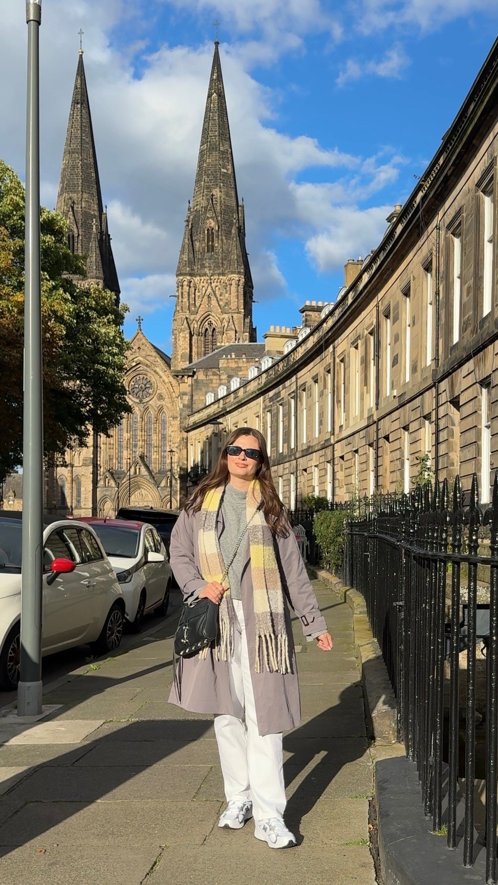 What I wore in Edinburgh Scotland during a fall trip! I love this storm gray trench coat and layered it over white relaxed jeans and New Balance 408 sneakers.

#LTKootd #LTKSeasonal