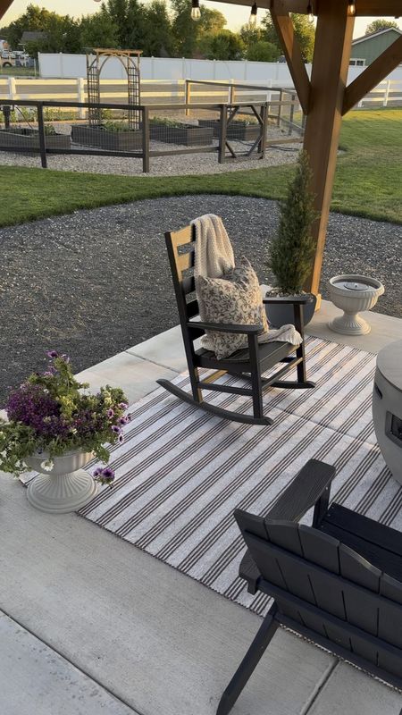 Rocking chair, Outdoor living, summer, living, round concrete, fire, pit, striped outdoor rug, Pollywood furniture, patio must have, outdoor planters