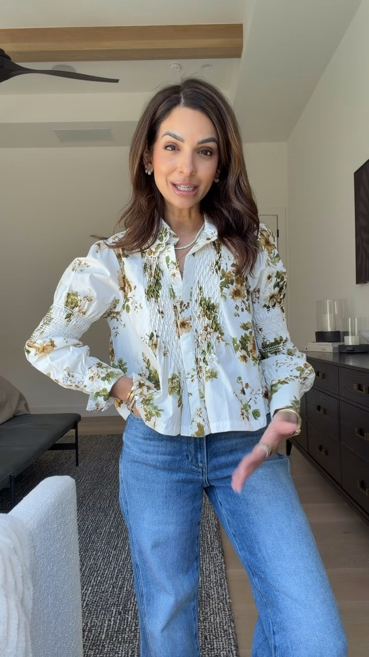 This @Anthropologie top screams fall floral! Such a great transition piece with denim.