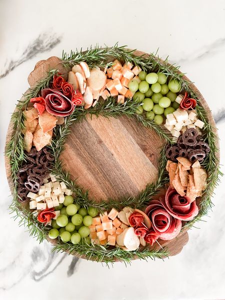 This super easy Charcute-Wreath perfect for any Holiday party! #christmasrecipes #charcuterieboard #christmascharcuterie #christmasrecipies #christmasparty #christmasentertaining 

#LTKHoliday #LTKhome #LTKSeasonal