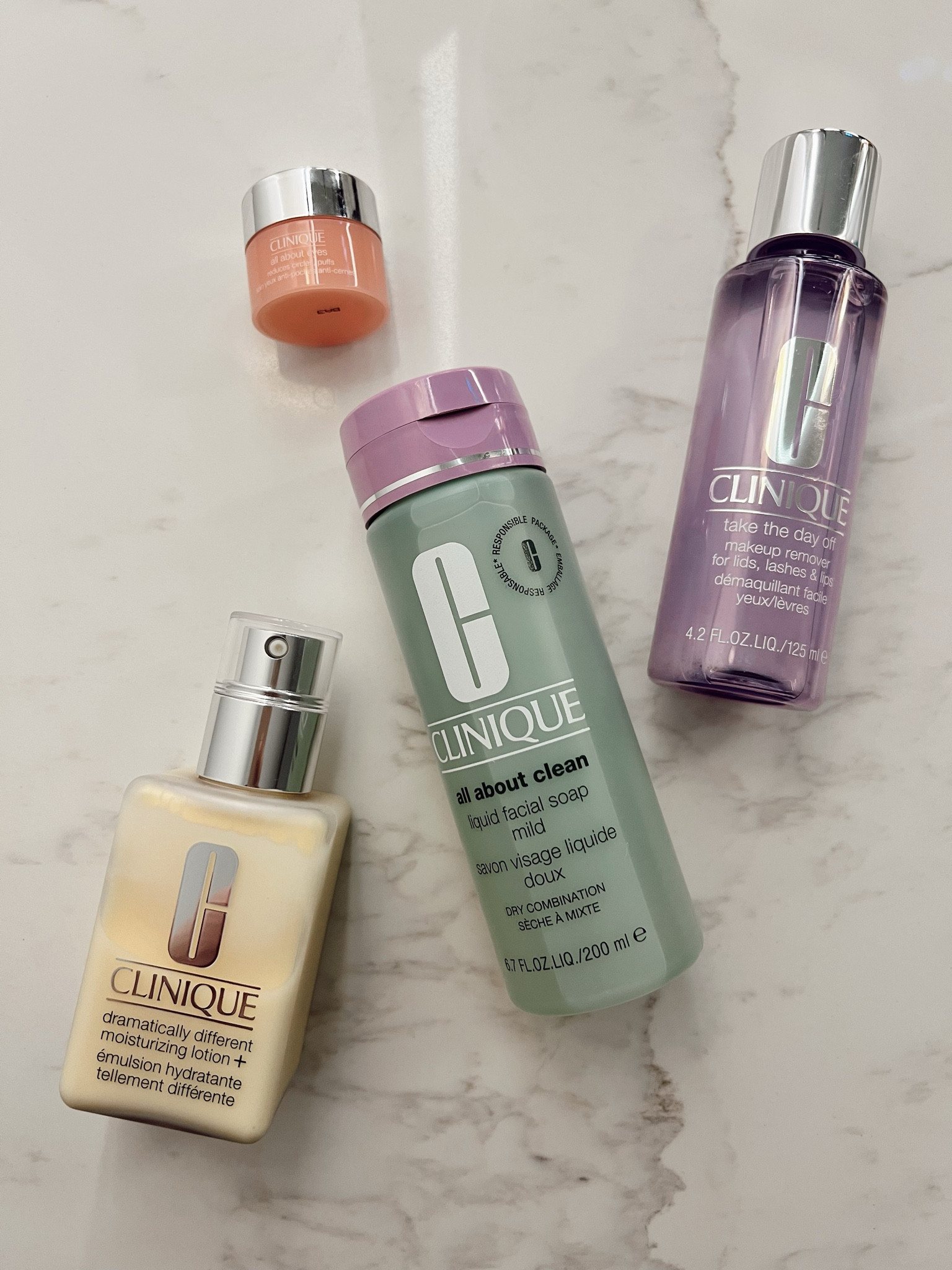 Clinique icons set with take the day off makeup remover that I absolutely love because of how effortless it is! I then use the all about clean face soap to clean all impurities, topped with eye cream and then the dramatically different moisturizing lotion that does wonders to my skin! Makes my skin feel lightweight, bouncy and smooth 

#Clinique #CliniquePartner

#LTKGiftGuide #LTKBeauty