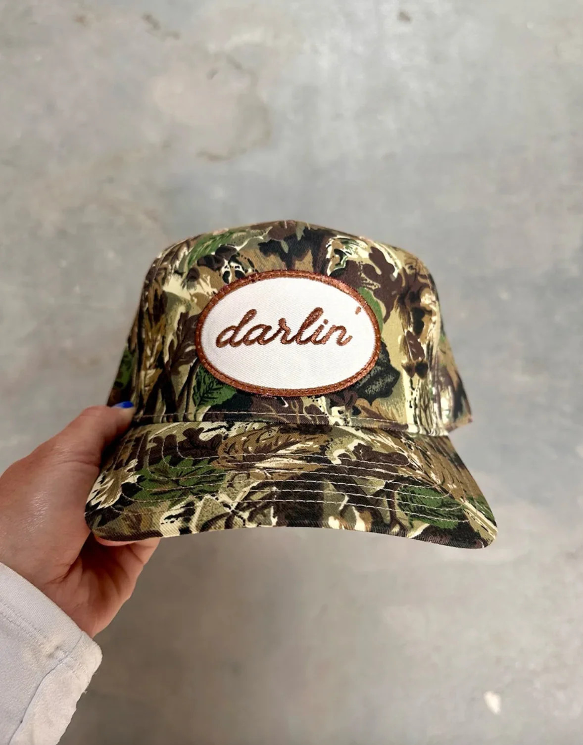 DARLIN Patch Trucker Hat in Camo | Glitzy Bella