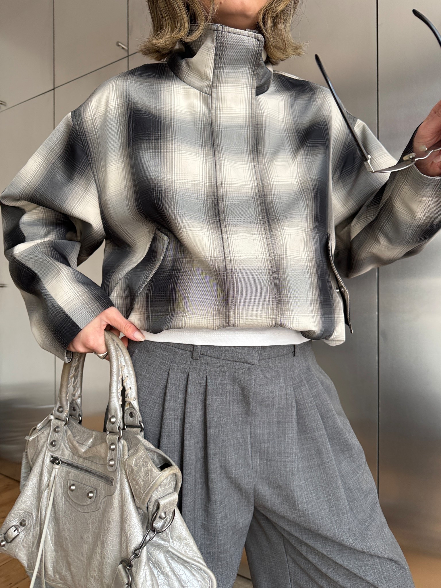 Funnel neck, check jacket, grey trousers, technical jacket, M&S

#LTKspring #LTKuk