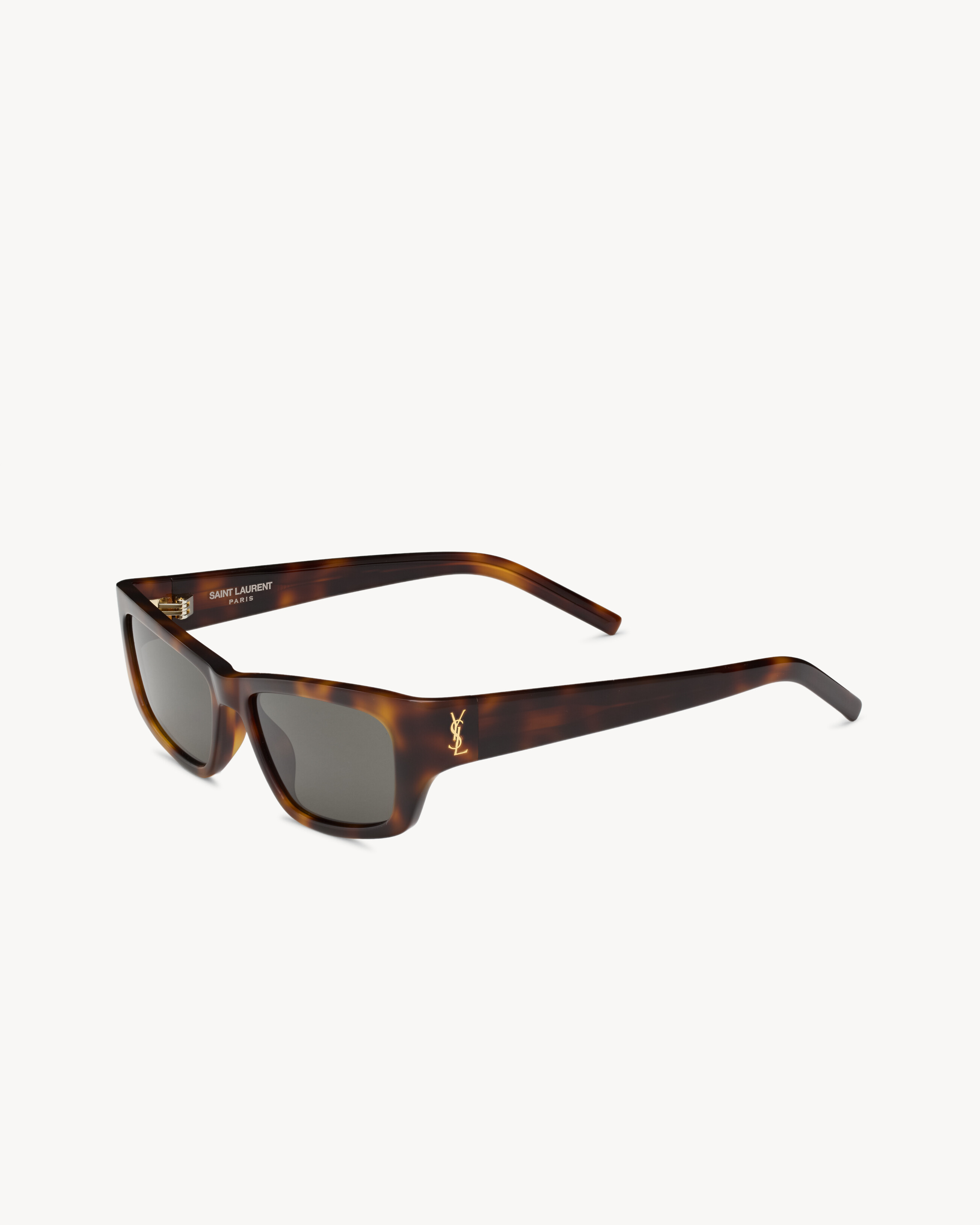 Geometric cat-eye sunglasses with tortoiseshell acetate frames and nylon lenses. | Saint Laurent Inc. (Global)
