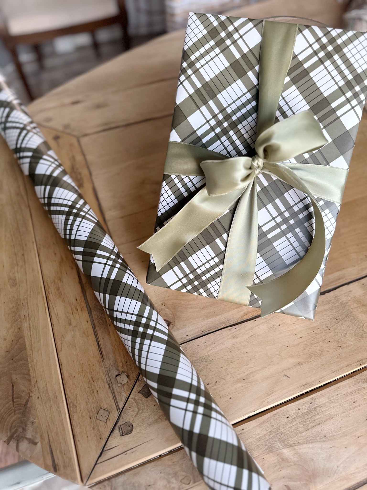 I love this dark brown plaid wrapping paper I found recently.

I added a green satin ribbon and it makes a beautiful Christmas package to put under the tree. 

#LTKHome #LTKSeasonal #LTKHoliday
