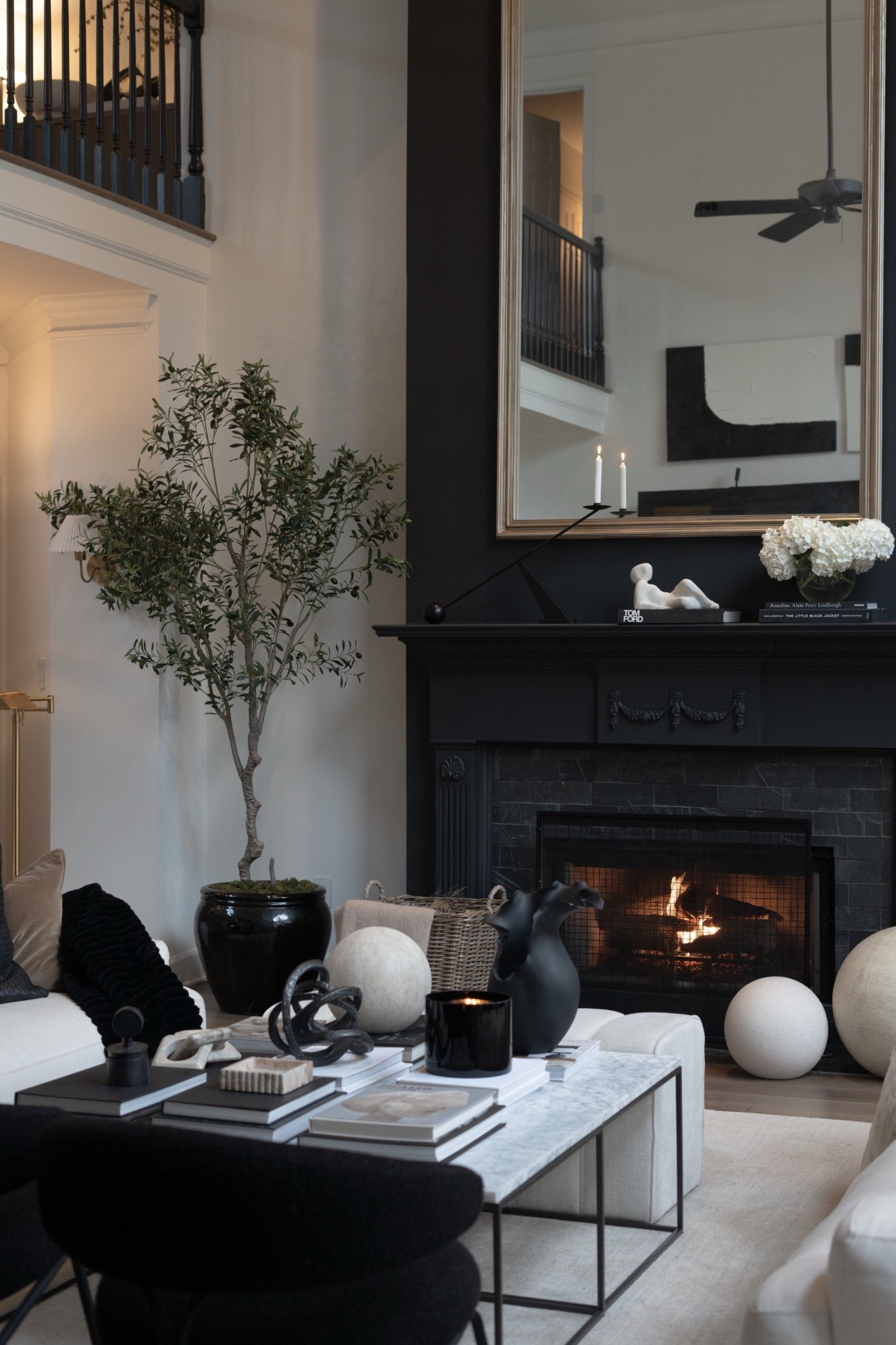 Post-Christmas living room views and I am SO obsessed! The layered black and cream palette, sculptural decor, cozy pillows, and organic greenery create the perfect modern luxury vibe. This space feels warm, elevated, and effortlessly chic, with timeless neutrals and bold contrast doing all the work. It’s the kind of interior design that feels calm yet dramatic, curated yet livable, and so perfectly classic modern for everyday luxury living.



#LTKFindsUnder100 #LTKOver40 #LTKHome