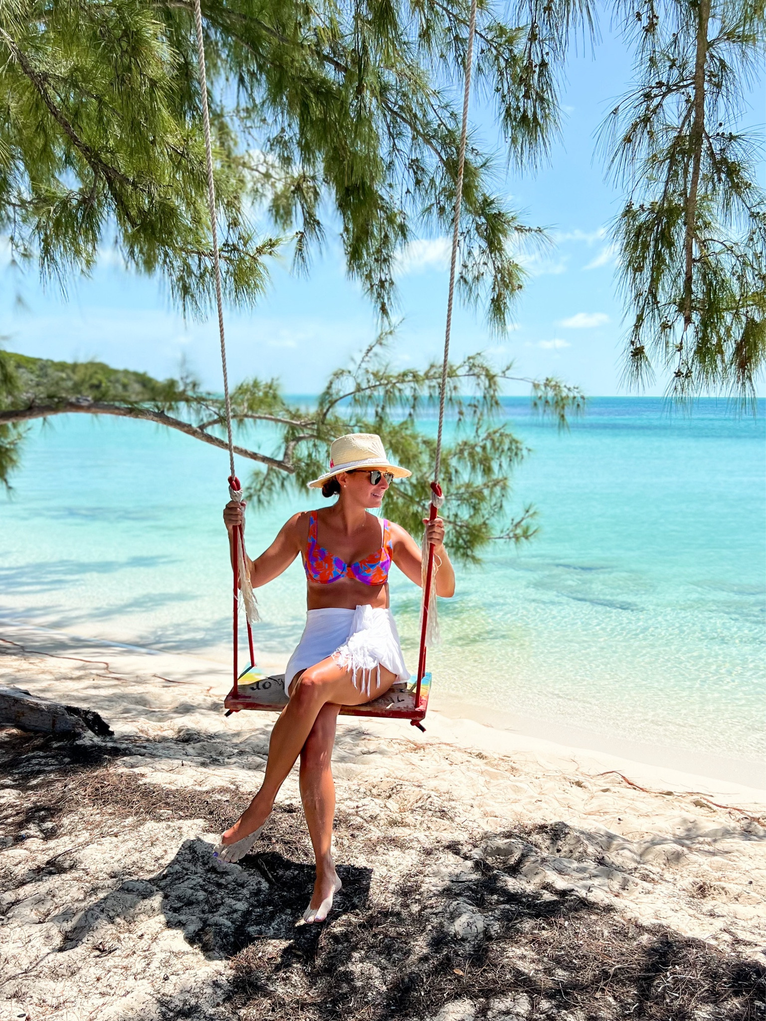 Fun vibrant swimsuit and sarong 

#LTKSwim #LTKTravel
