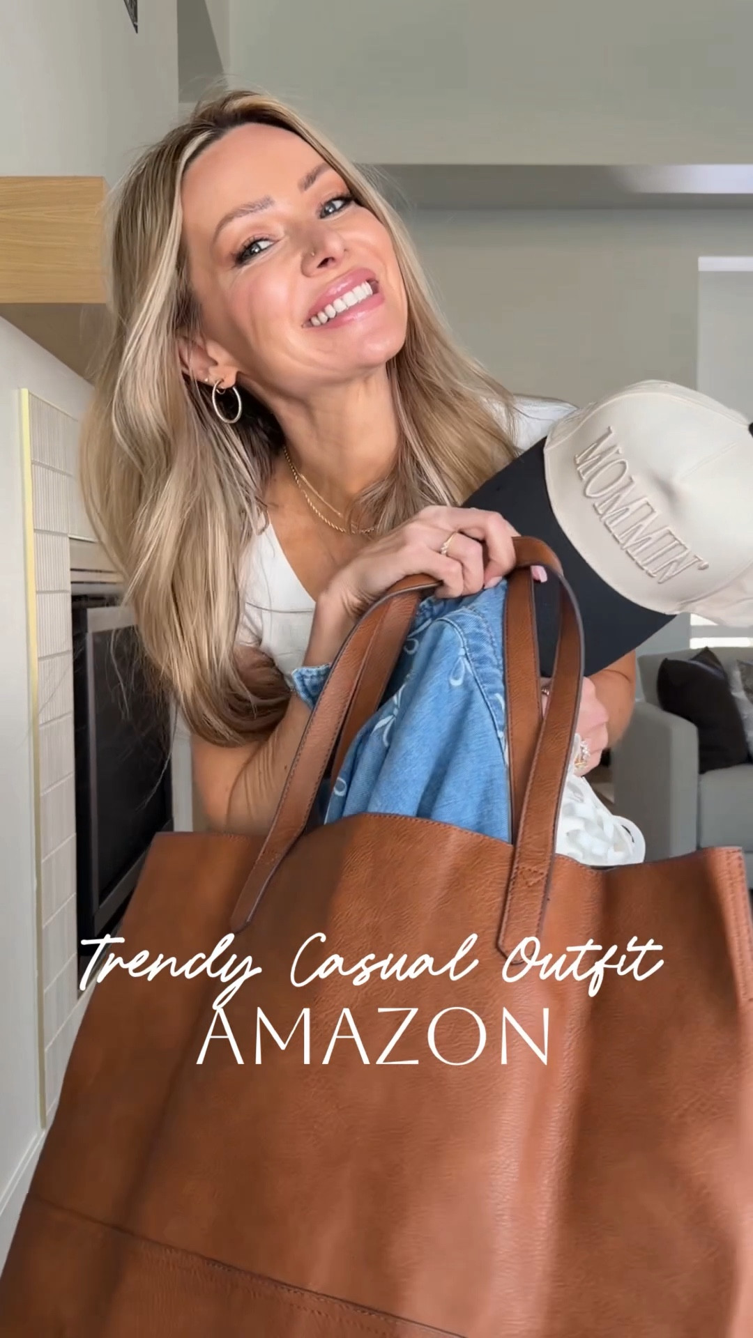 Amazon outfit I keep reaching for 🤍 comment AMAZON and I’ll send you the details 
This trendy yet comfortable everyday look is the definition of neutral chic meets elevated basics—featuring a lightweight denim layer, relaxed wide-leg pants, and clean white sneakers for an easy mom-on-the-go style. Perfect for errands, coffee runs, travel days, and casual spring outfits without the high price tag.

#AmazonFashion #AffordableOutfitIdeas #NeutralChic #ElevatedBasics #MomStyle