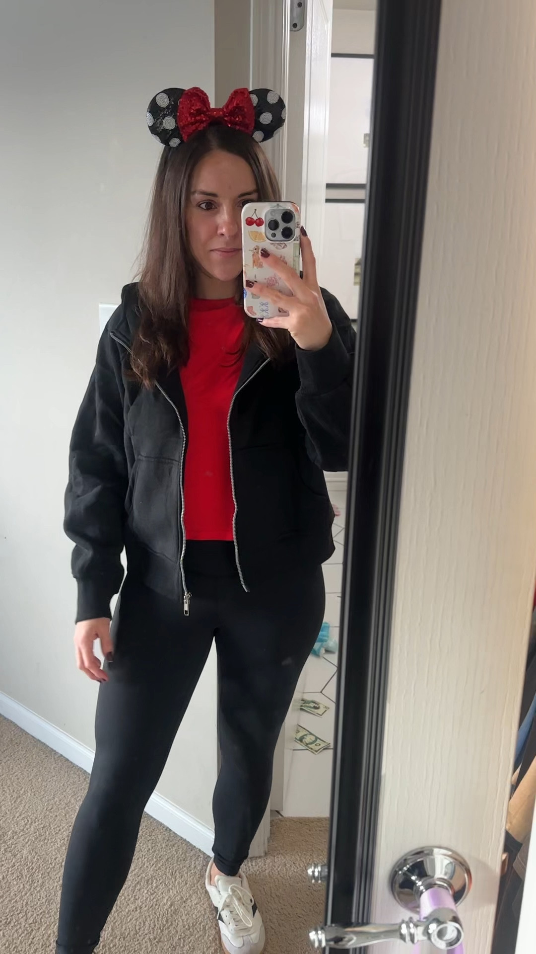 Easy Disney day outfit 🖤❤️
Wearing a red fitted tee with black leggings and a lightweight zip hoodie. Comfy enough for walking the parks but still cute. Paired with my favorite white sneakers. Perfect for travel days, park hopping, or running around with the kids.