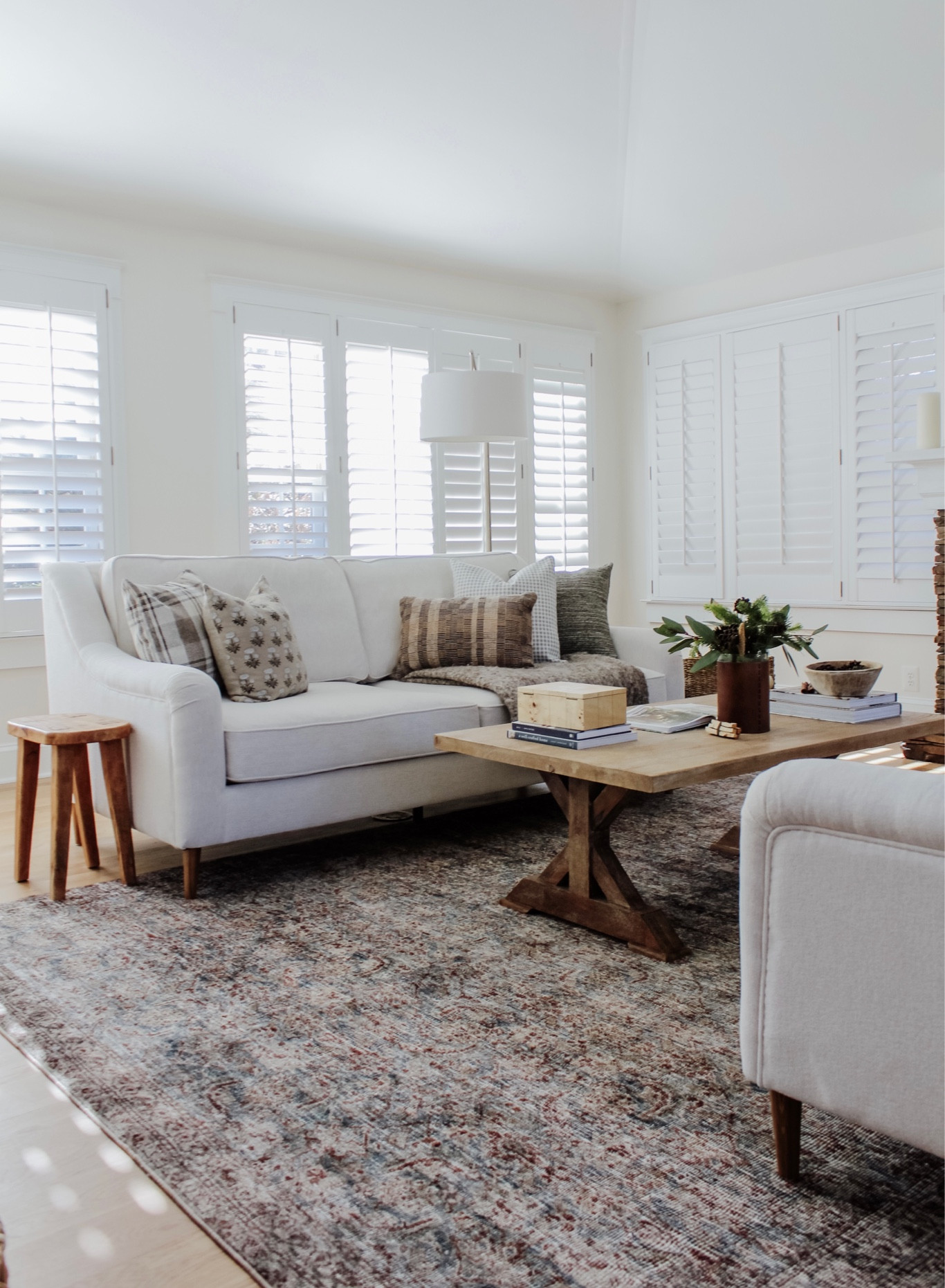 Our sofas have finally arrived, but today I want to chat the impact of a rug! ✨ A lot in this space is temporary due to other priorities, but by simply swapping the rug, we have a space we can enjoy before fully furnishing 🤍 @loloirugs does it again with the beautiful Morgan Rug in Sea/Sage, using the CloudPile technology that everyone rightfully swoons over. Shop via the link in bio and head to stories for a close up of the coloring! #theloloilook 
•
•
•
Loloi rug, soft rug, neutral pattern rug, morgan rug, neutral living room, sofa, coffee table decor, wood coffee table, living room style 

#LTKhome #LTKFind #LTKstyletip