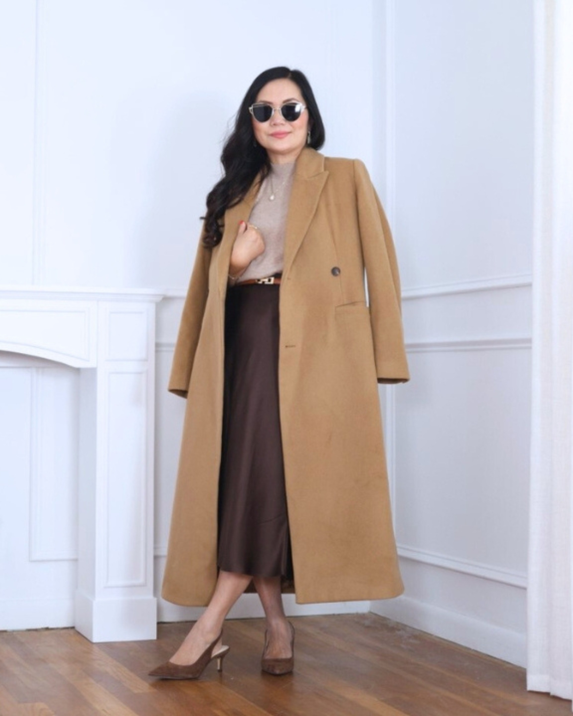 Wearing a wool coat, mock neck top, and silk skirt — all from Quince. A simple, refined combo that feels timeless and put-together. I’m 5’2, wearing size XS.

#LTKOver40 #LTKPetite #LTKStyleTip