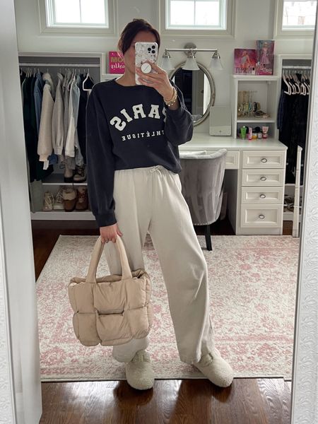 Super cozy and casual winter outfit with sweatpants, printed sweatshirt, Boston clogs, and puffer purse 

#LTKshoecrush #LTKU #LTKitbag
