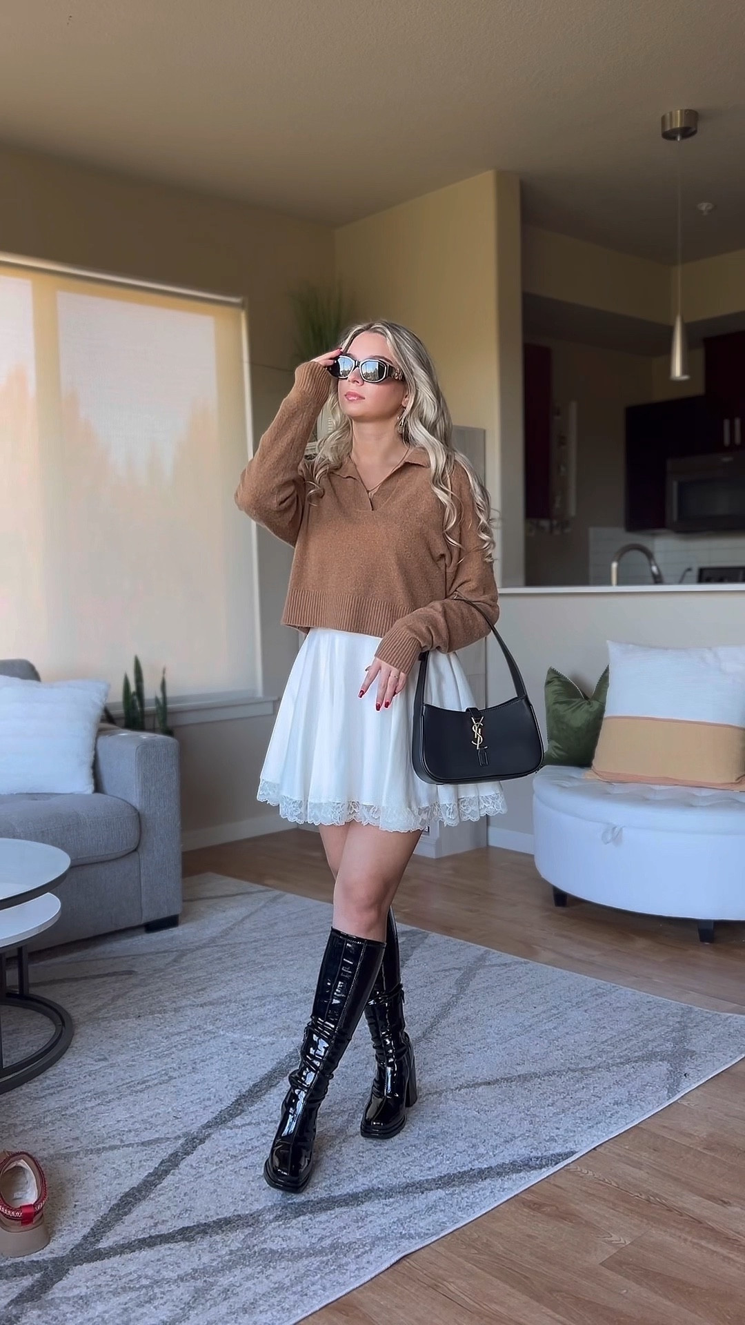 How to style your summer dresses this season! 🍂 Add a warm tone cashmere sweater. There are no links for the one I am wearing. But your can find second hand with the name “reformation cashmere cropped polo sweater” The white dress is houseofcb and the black boots are Steve Madden object tall boot. 

#LTKSeasonal #LTKstyletip #LTKVideo