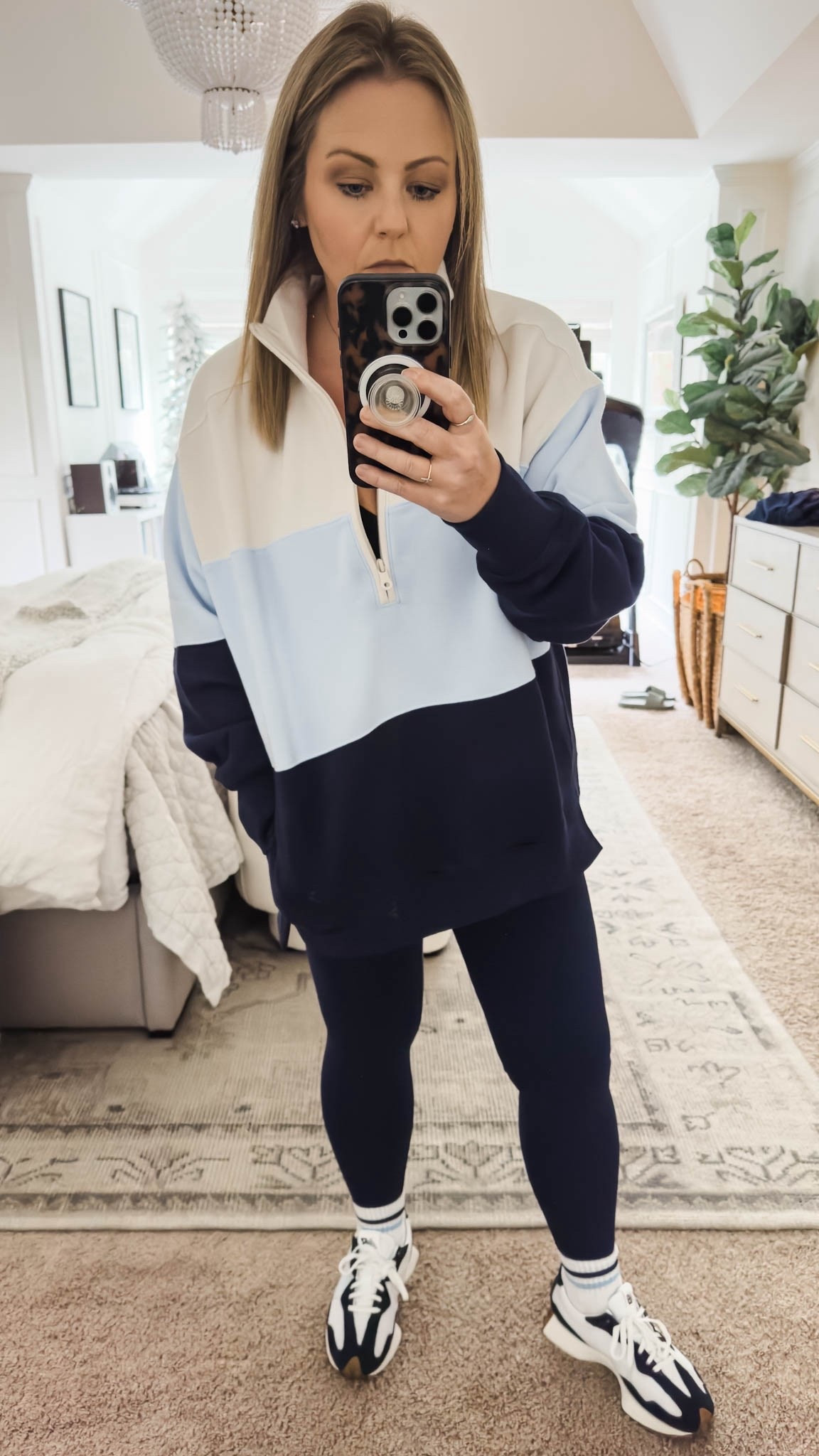 This striped quarter zip sweatshirt is back in stock and is currently 25% off. It’s also available in several different solid colors. I sized down a size for an oversized fit. My leggings are also 40% off! This is the perfect outfit to wear at home or when you are out and about. athleisure outfit casual outfit casual wear ladies pullover 

#LTKActive #LTKdayinmylife #LTKSaleAlert