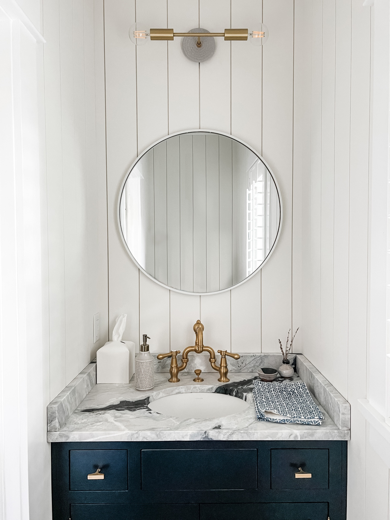If you’re looking for simple bathroom mirrors, Wayfair has them! and they’re on sale! 🏷️

We got ours from Birch Lane, part of the Wayfair family, and used them in both our powder bath (featured here) and primary bathrooms. It comes in a variety of colors/finishes; we chose white to complement the shiplap and not take away from the brass accents and darker ‘Inkwell’ colored vanity alongside the natural leather-textured granite  ‘Arctic Ocean’. 
• Bathroom faucet is Newport Brass
• Lighting is from Cedar & Moss

#LTKhome #LTKstyletip #LTKFind