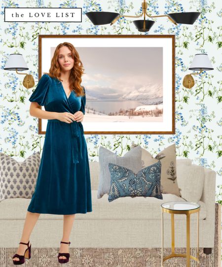 Peacock blue and warm linen combine to create a feminine living room. Floral wallpaper, linen sofa, block print pillows, brass sconces, linear chandelier, cocktail table, oversized art. 

#LTKhome #LTKSeasonal #LTKstyletip