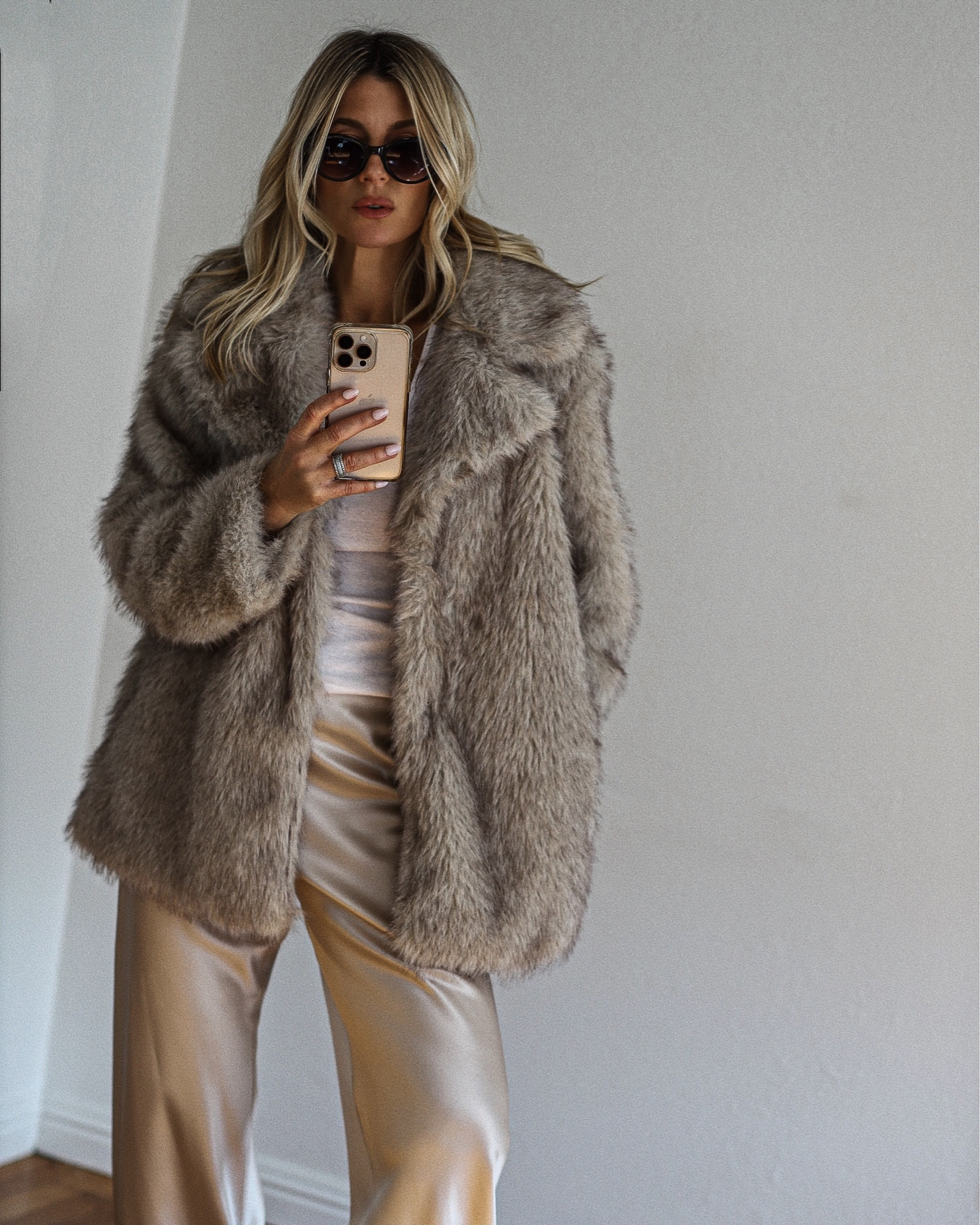 because silk pants and uggs do belong together 🤌

#winterstyle #winterootd #minimalstyle #minimalchic 

NOTE: they don't my version of Ugg anymore The Bailey also the faux fur is the exact same, they just have the worst lightening! 

#LTKdayinmylife #LTKootd