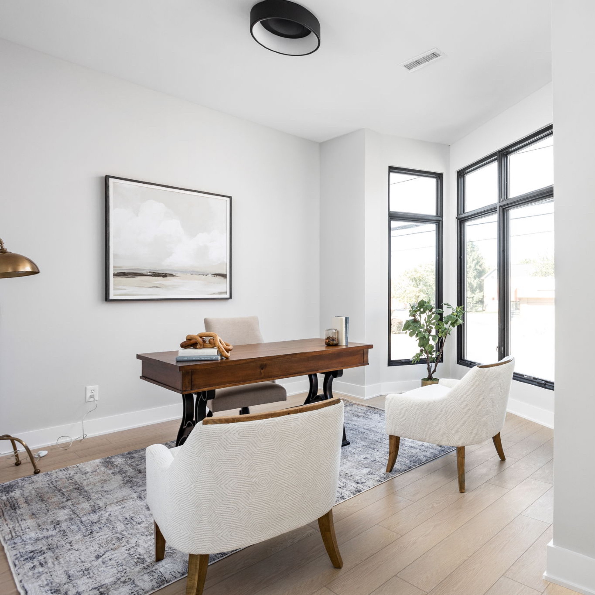 An organized and clutter-free home office. We love the contrast of light tone furniture with the wood and gold accents. 

Styled: Nested Spaces
Built: Estridge Homes
Photography: The Home Aesthetic

#LTKfamily #LTKhome